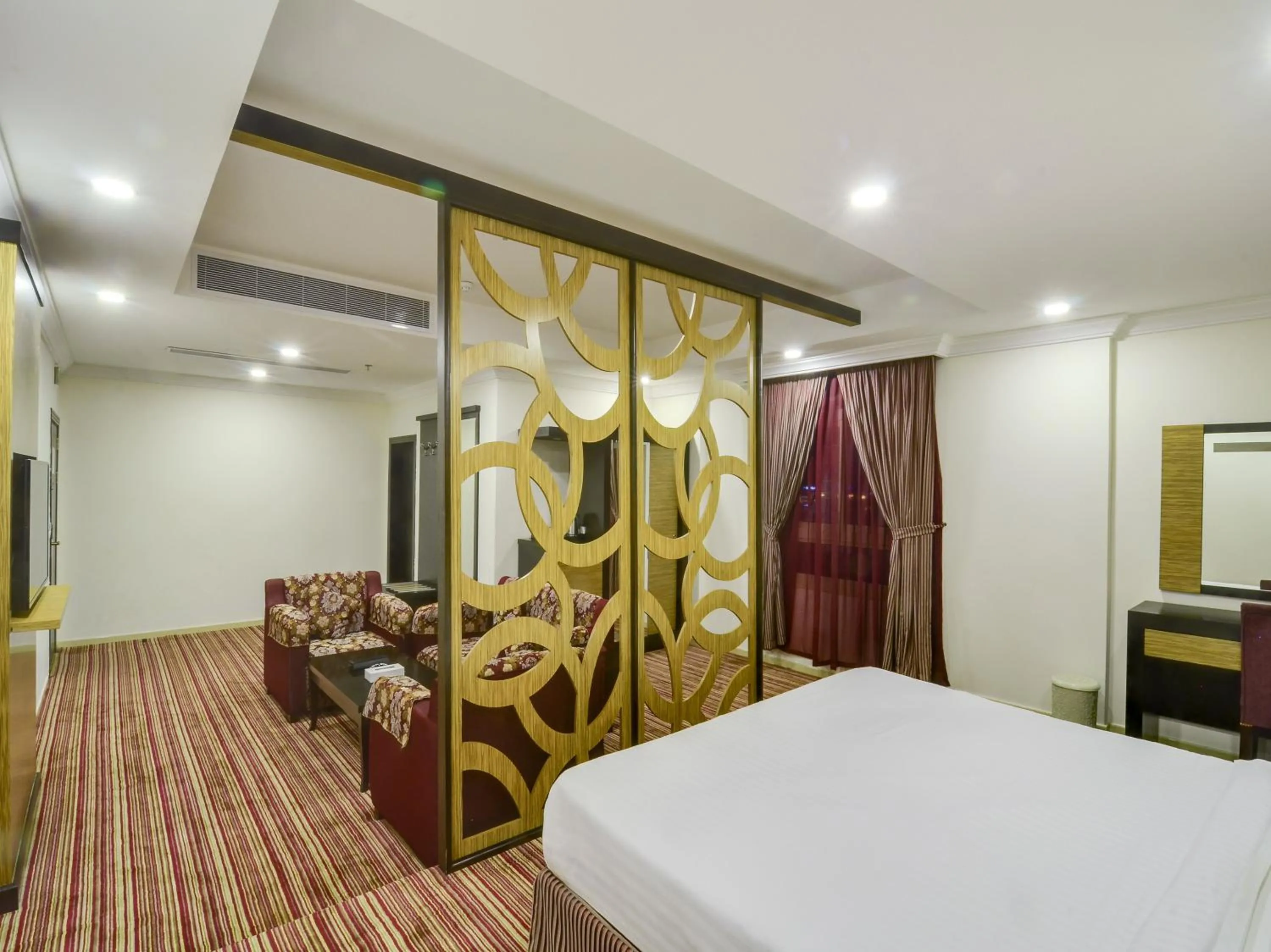 Seating area, Bed in Elaf Suites Al-Andalus