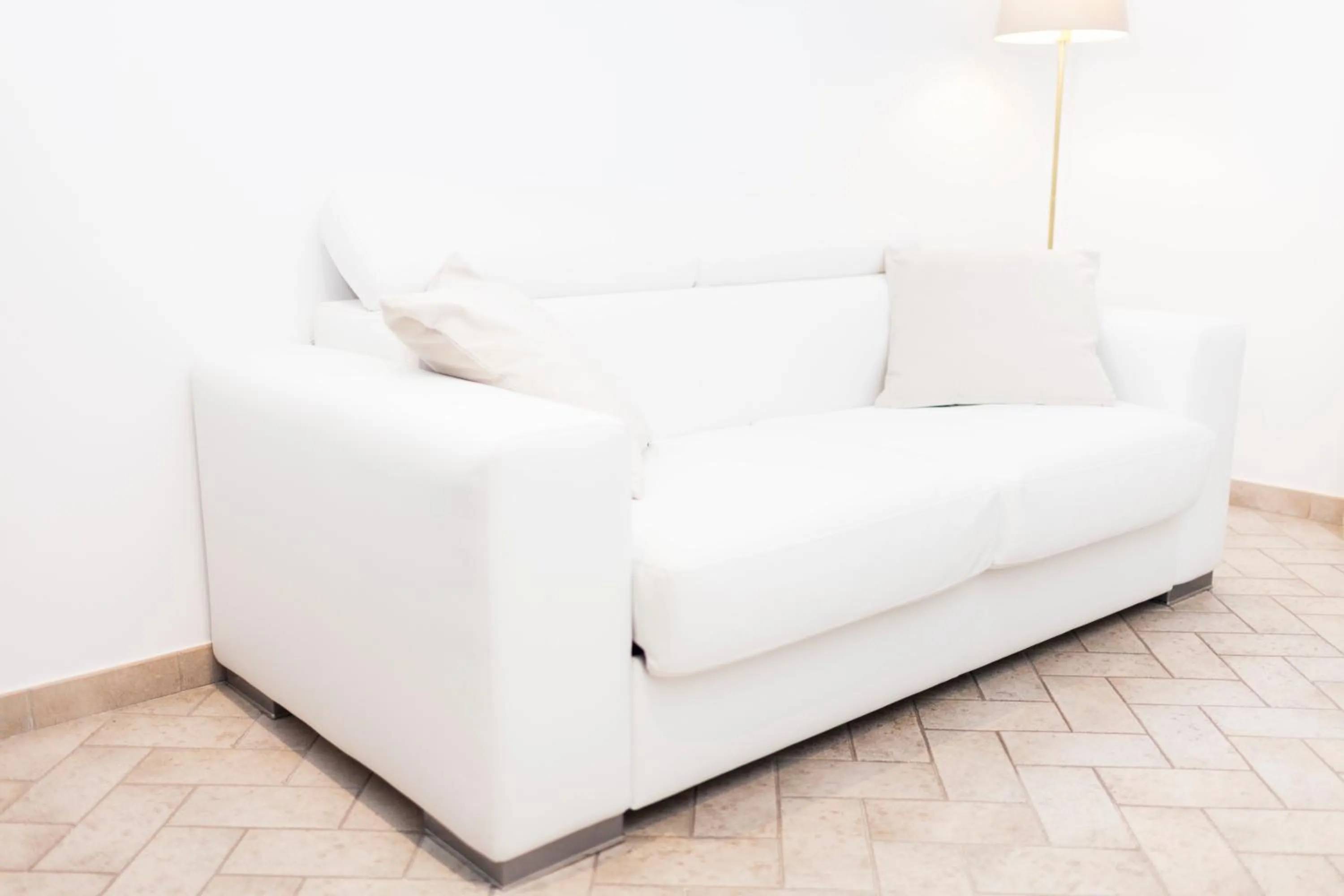 Bed in Tritone 91 Apartments