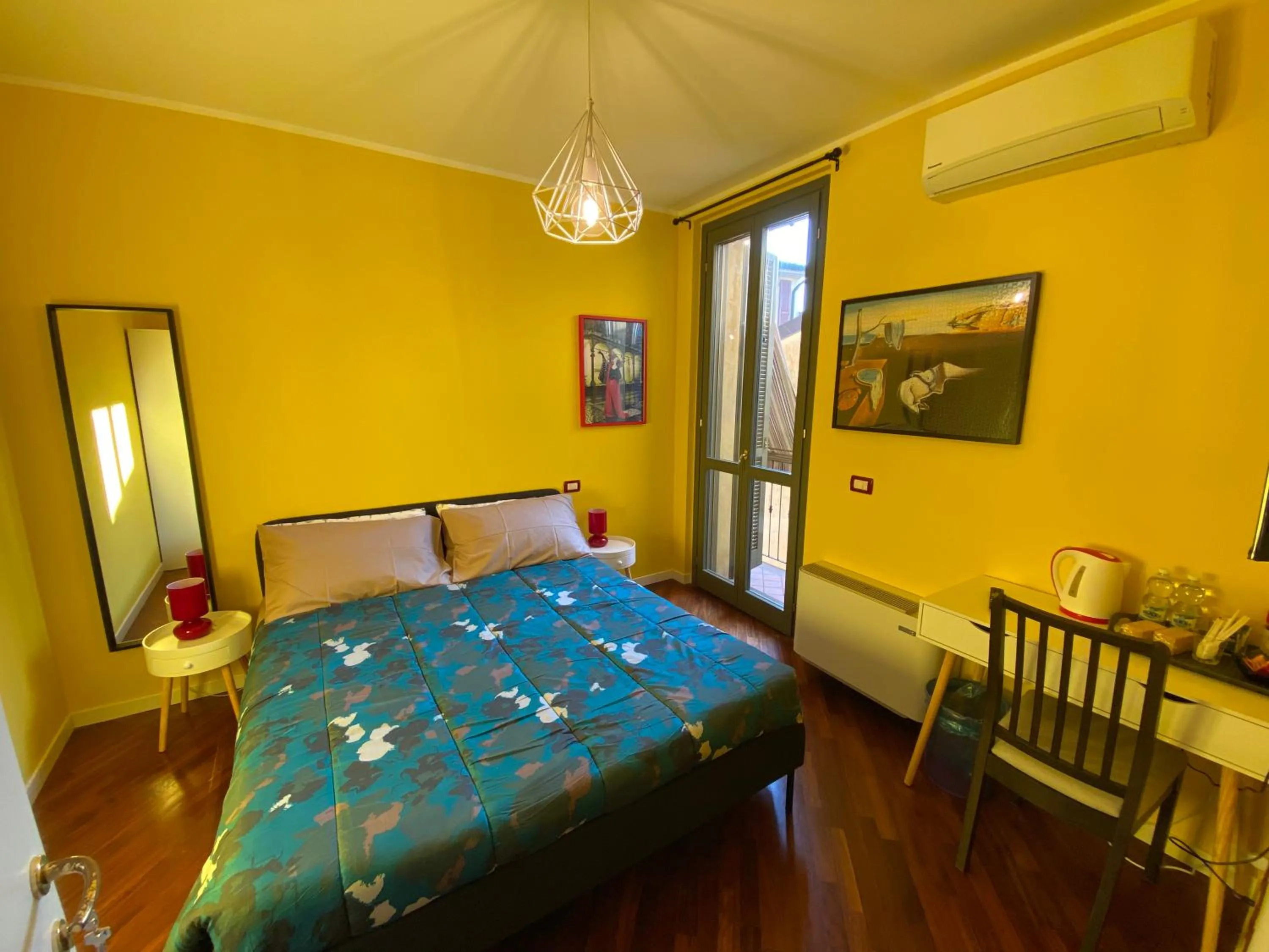 Bed in Amici Miei Rooms