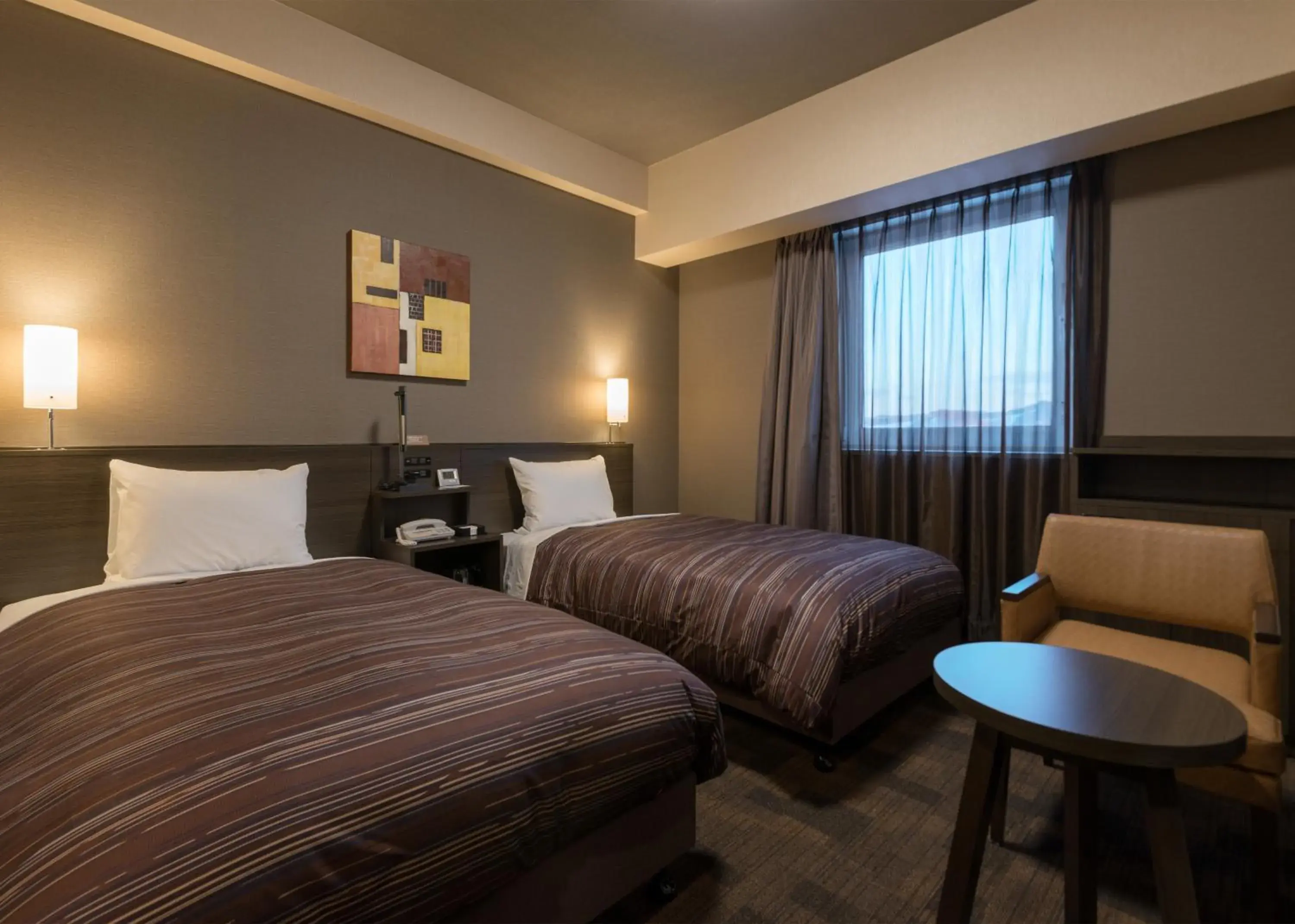 Bed in Hotel Route Inn Grand Kitami Ekimae Bed in Hotel Route Inn Grand Kitami Ekimae