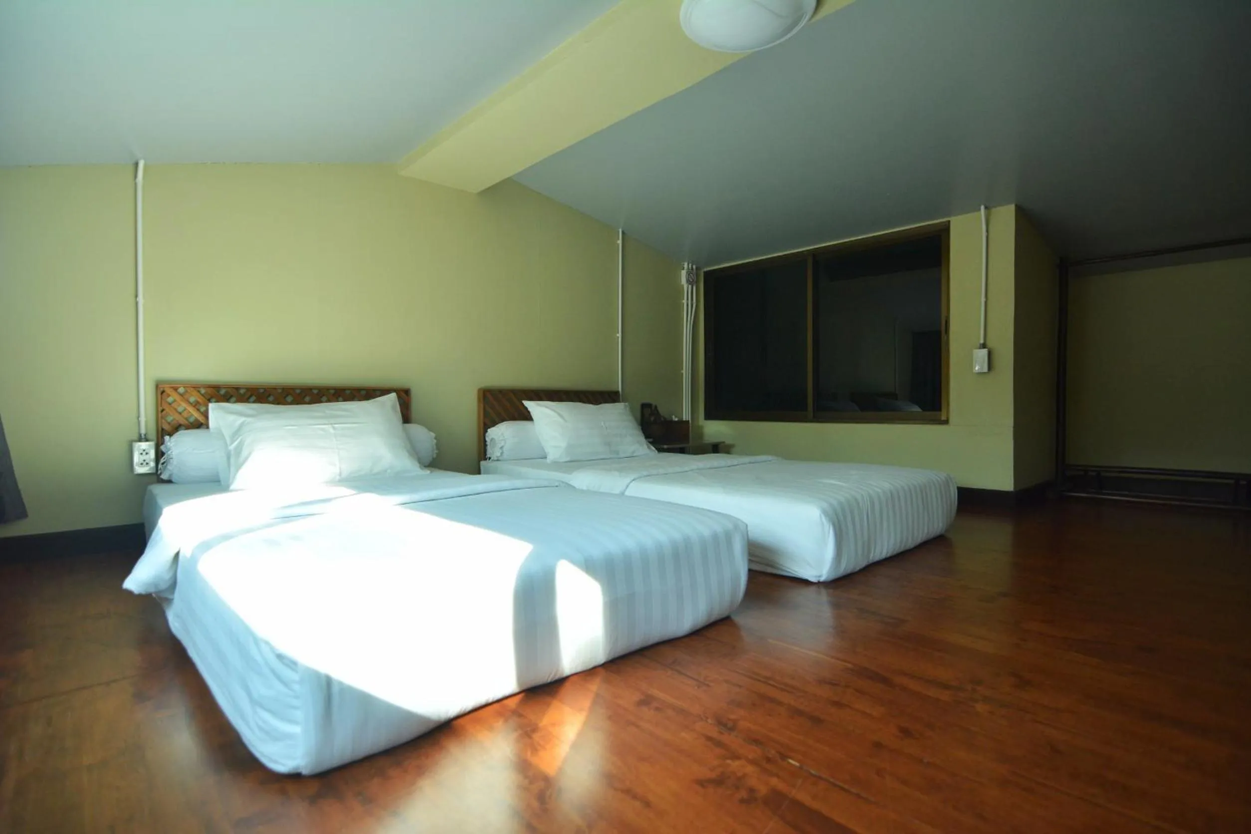 Bed in The Corner's unique house