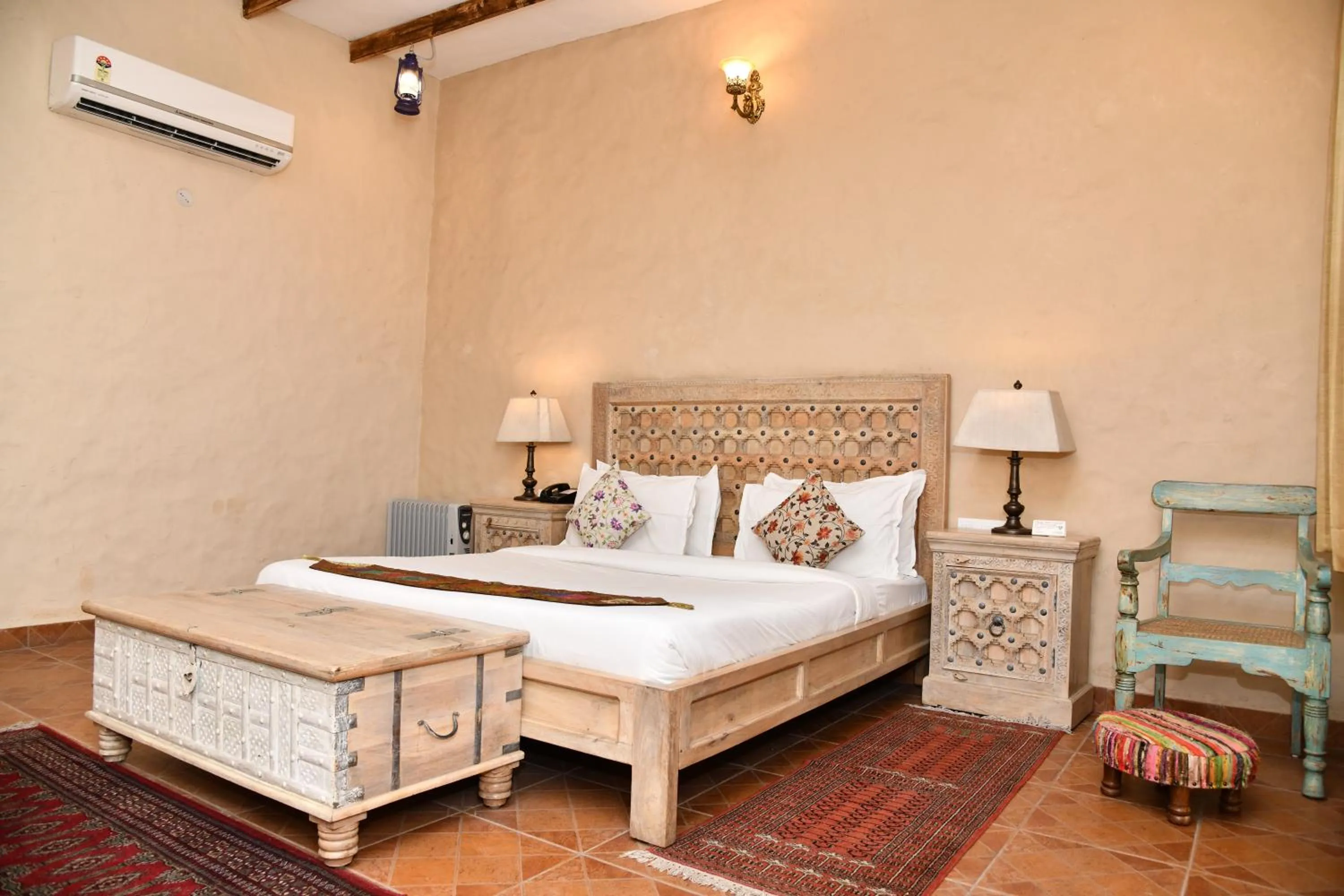 Bed in WelcomHeritage Ranjitvilas