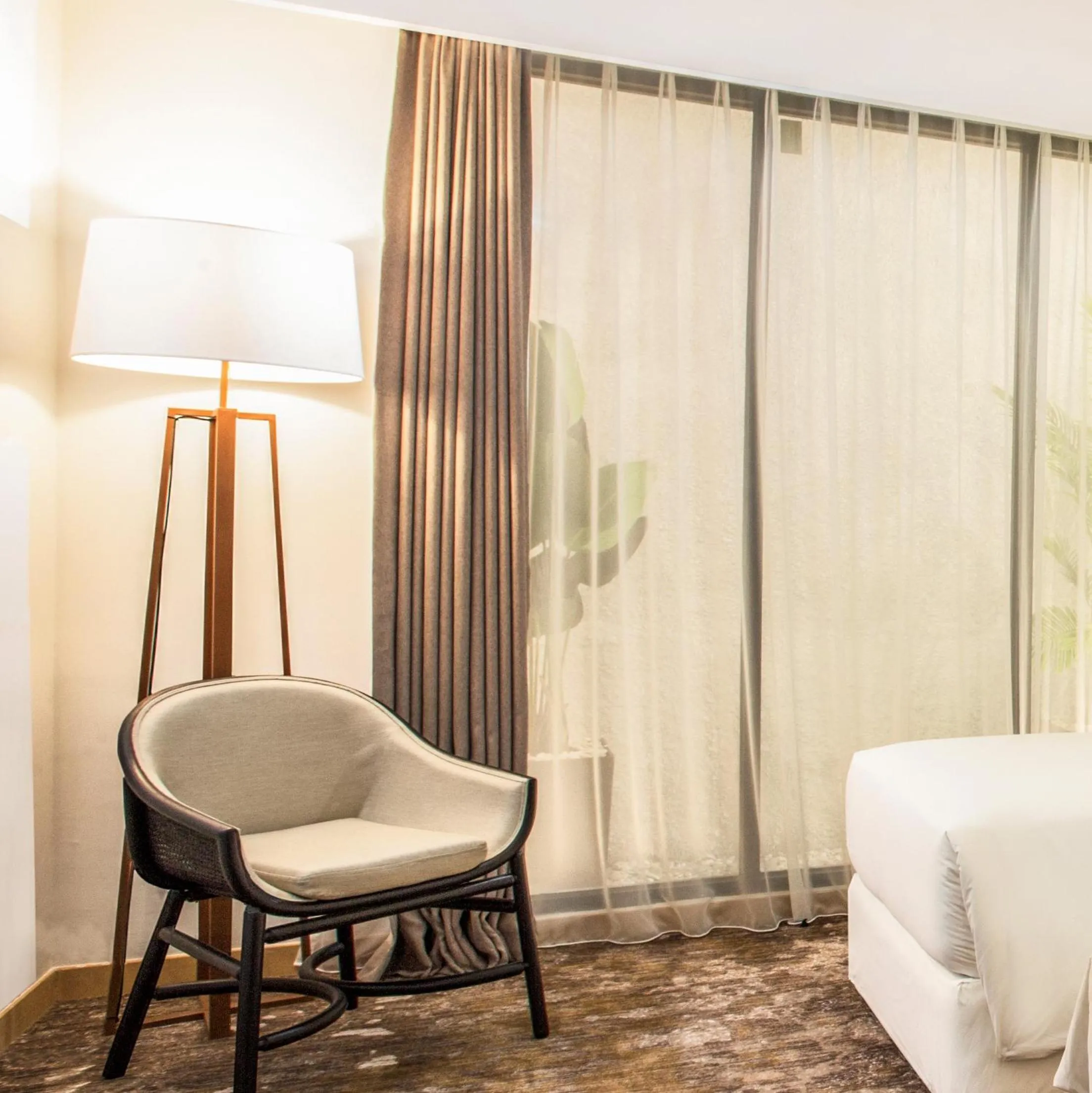 Seating area, Bed in Swiss-Belinn Singkawang