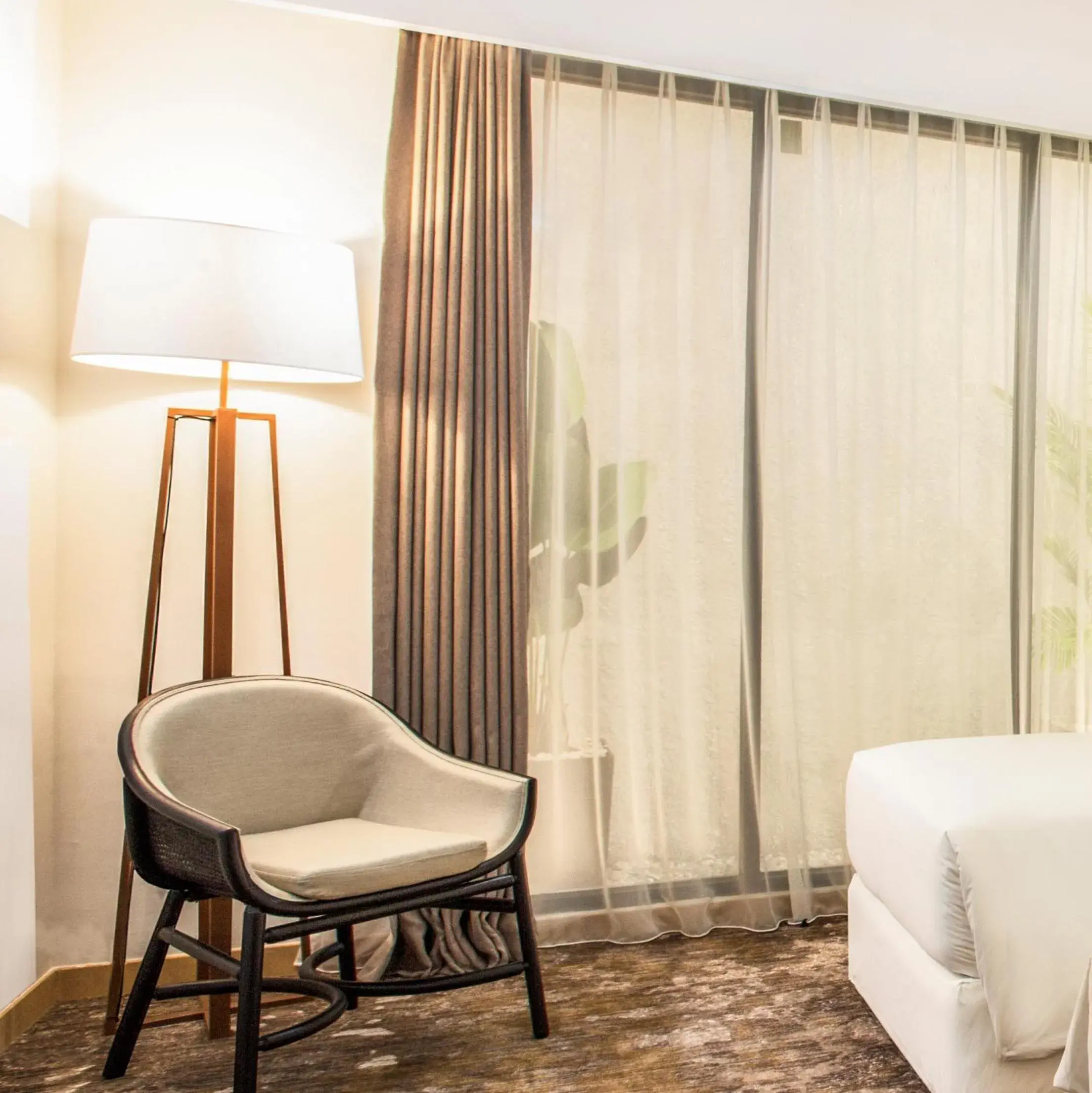 Seating area, Bed in Swiss-Belinn Singkawang Seating area, Bed in Swiss-Belinn Singkawang