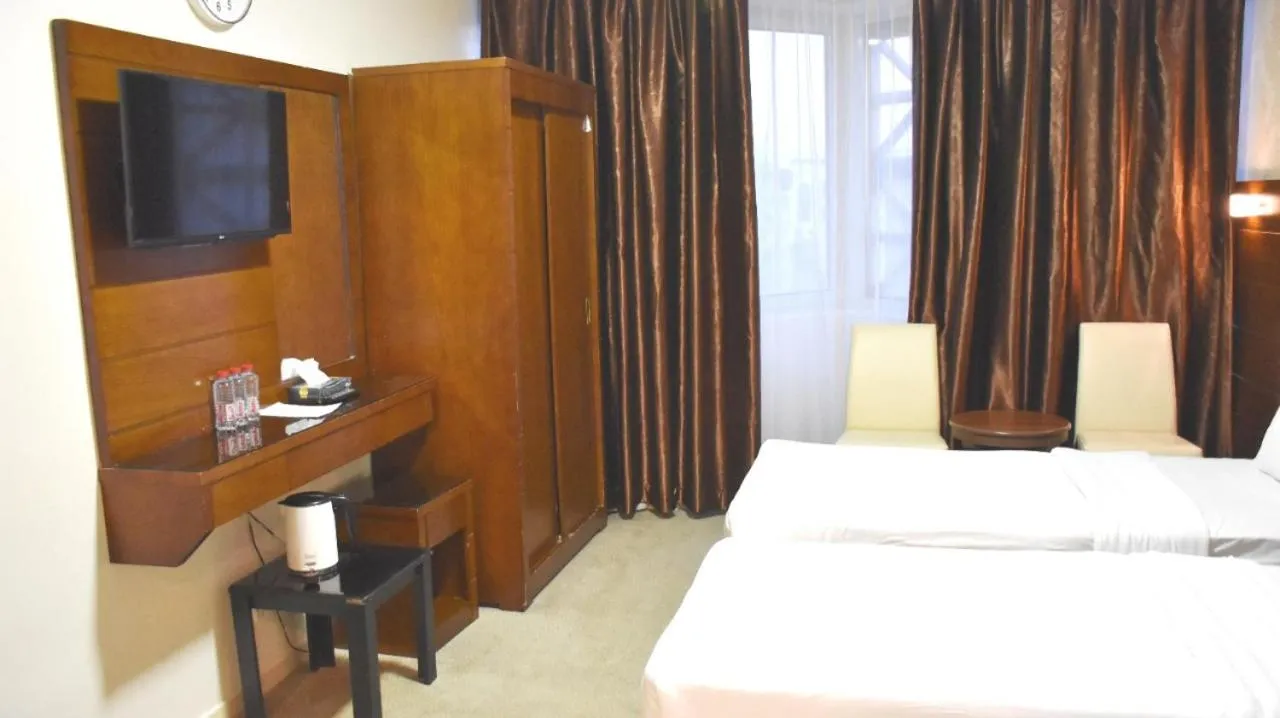 Bed in Mirage Al Salam Hotel