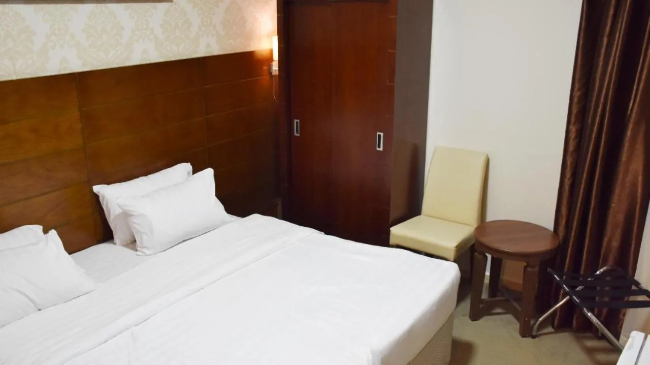 Bed in Mirage Al Salam Hotel