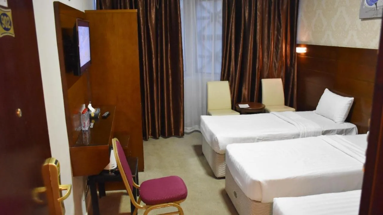 Bed in Mirage Al Salam Hotel