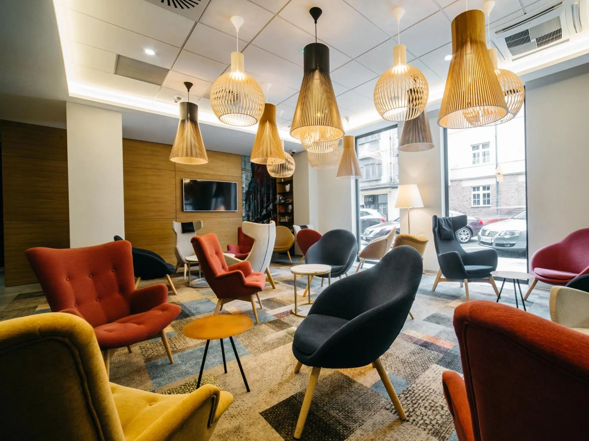 Communal lounge/ TV room in Q Hotel Plus Katowice