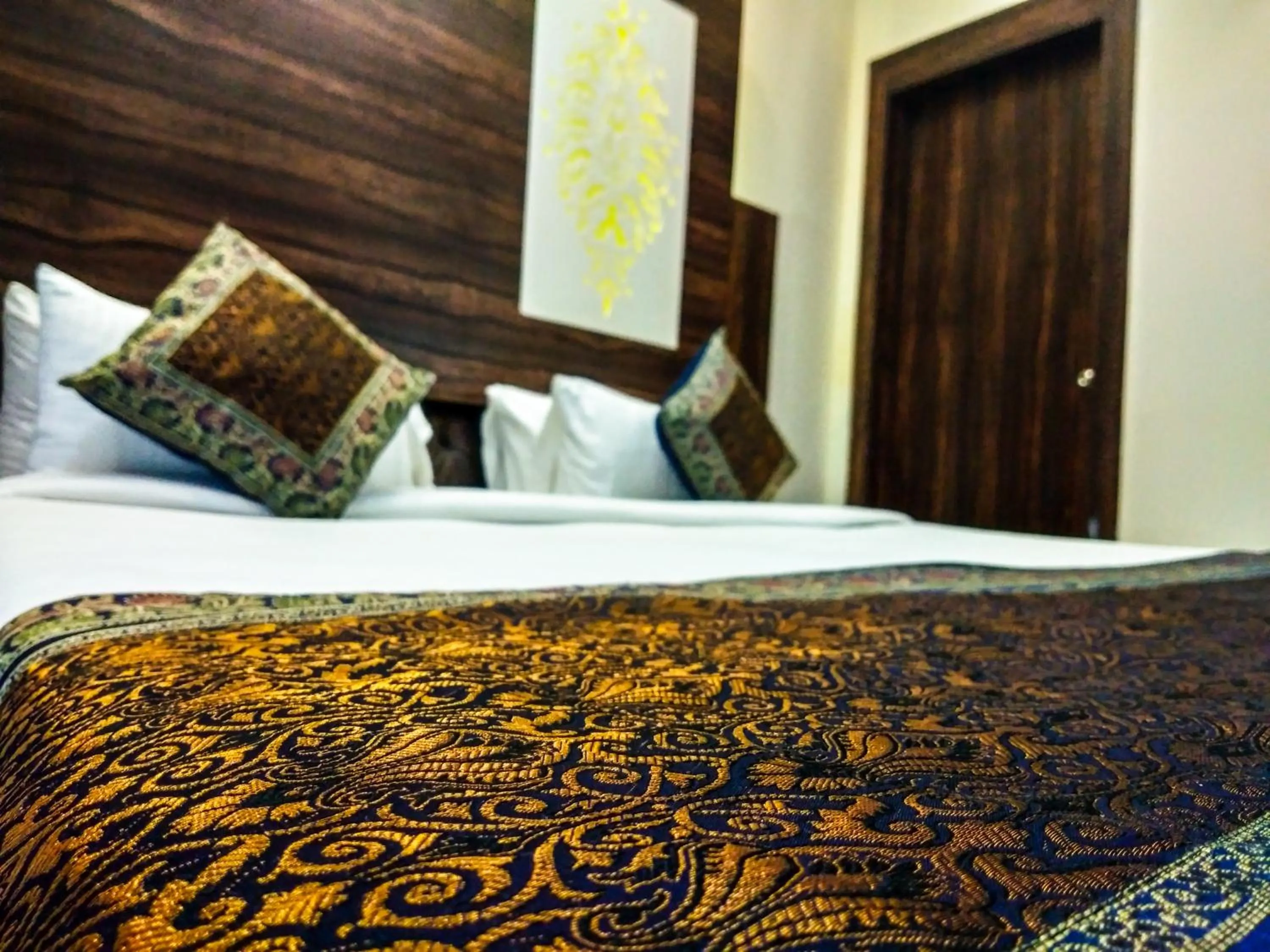 Bed in Dwivedi Hotels Sri Omkar Palace