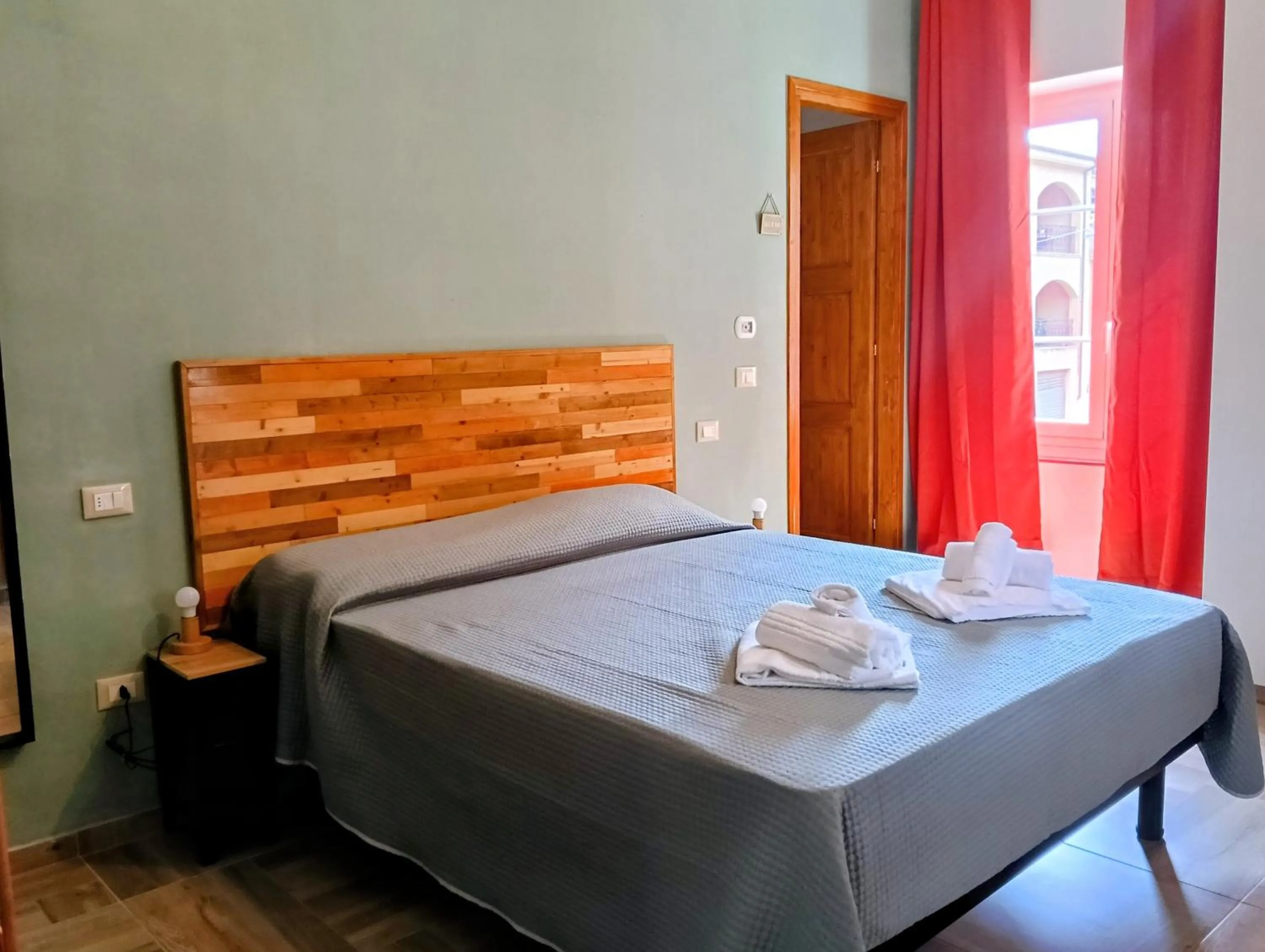 Photo of the whole room, Bed in Casa Nina