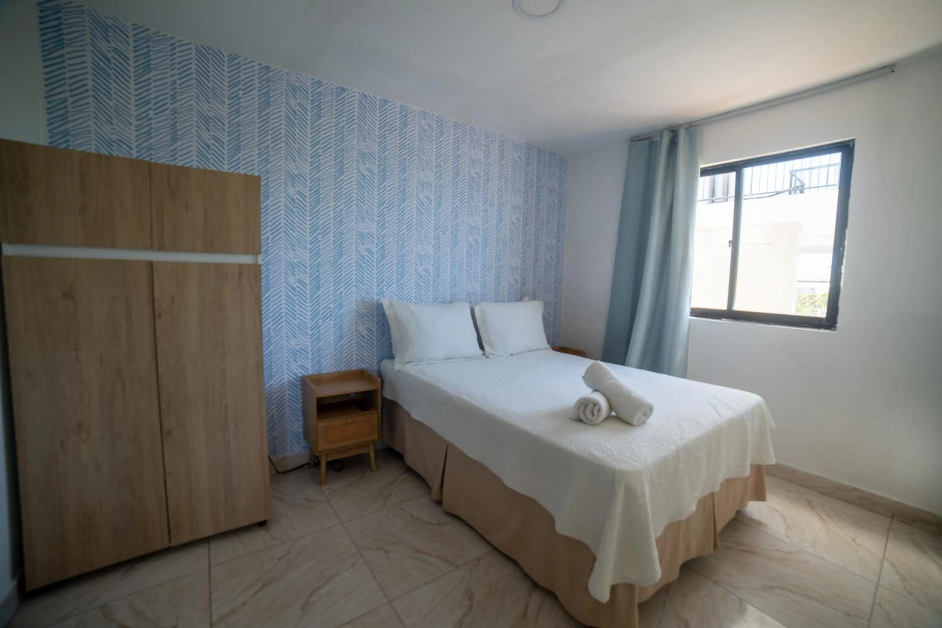 Bed in ZOJO MARiNA BAY