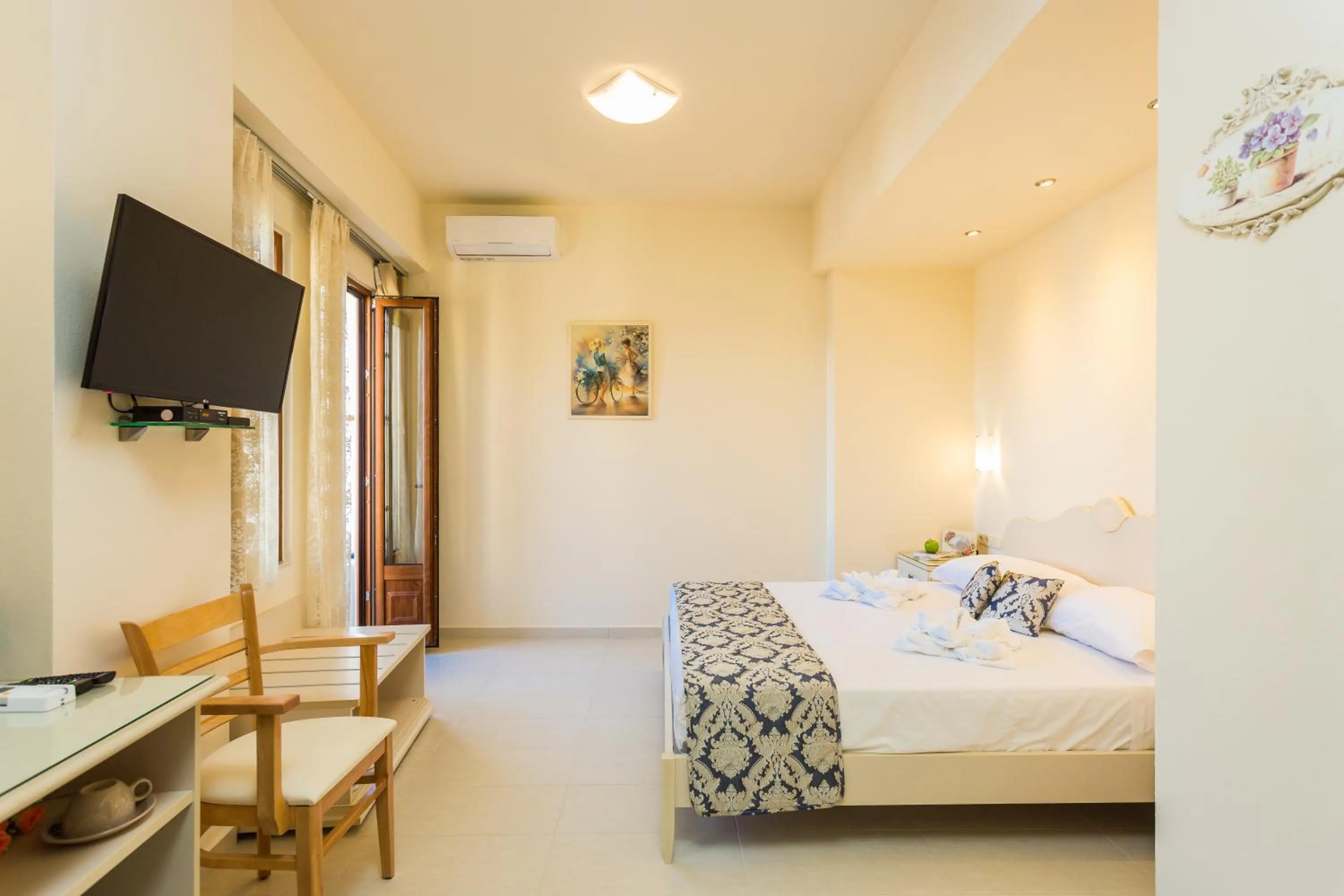 Bed in Polyxenia Suites