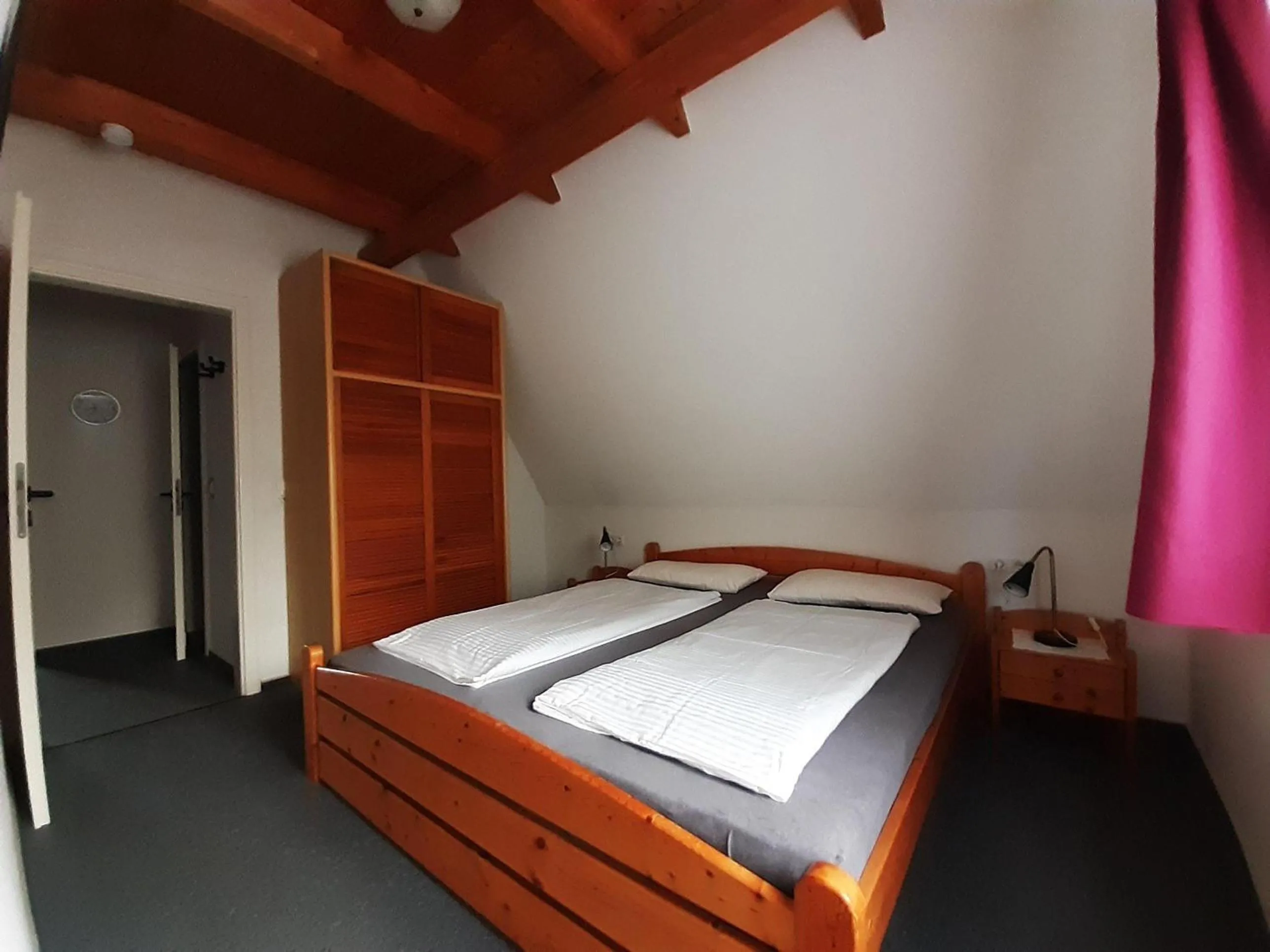Bed in Ferienwohnung-Stricker-Typ-B-Balkon-2-2