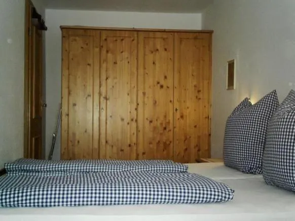 Bed in Sport-Alpin-Wohnung-130