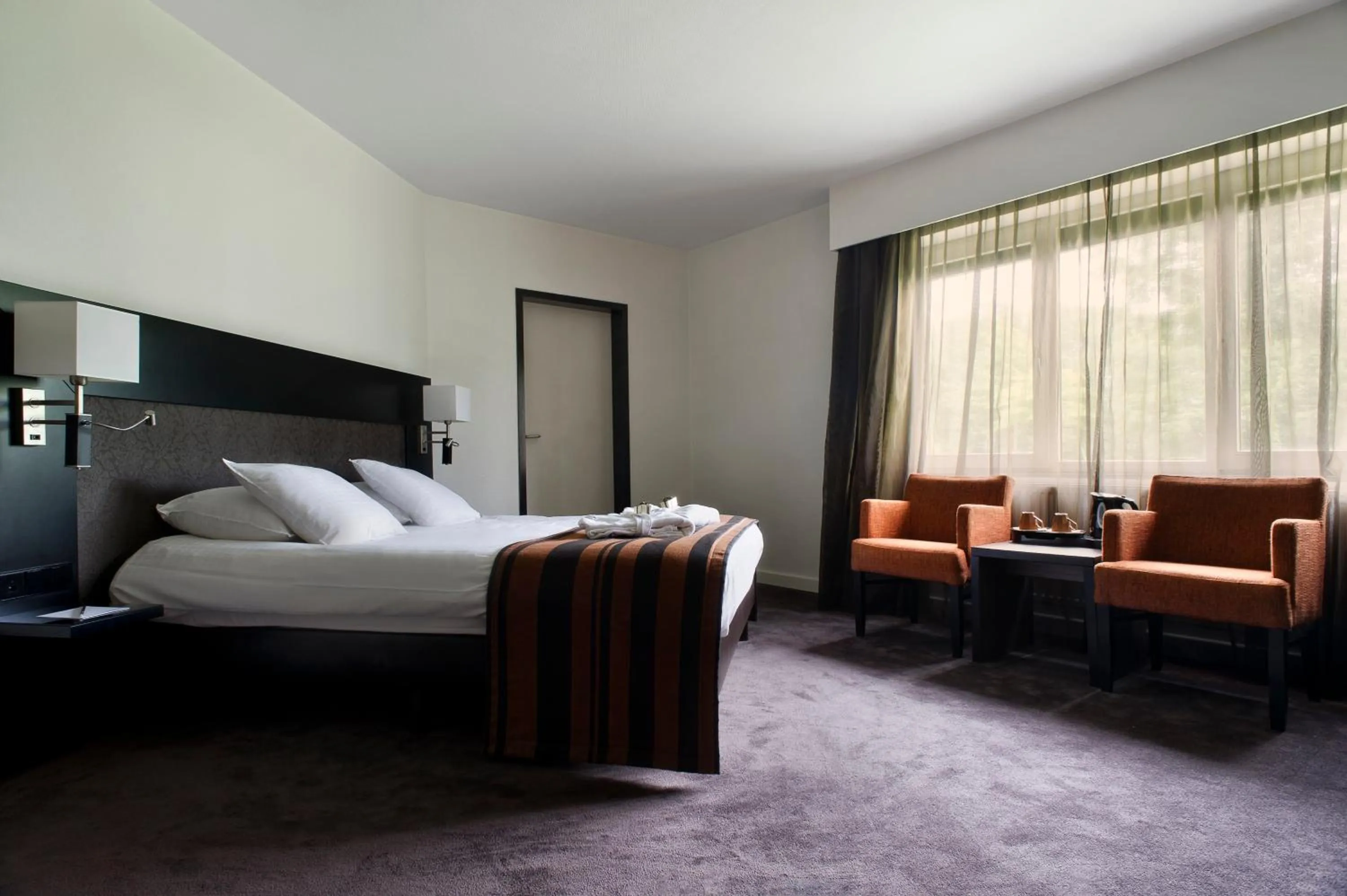 Photo of the whole room, Bed in Eurotel Lanaken