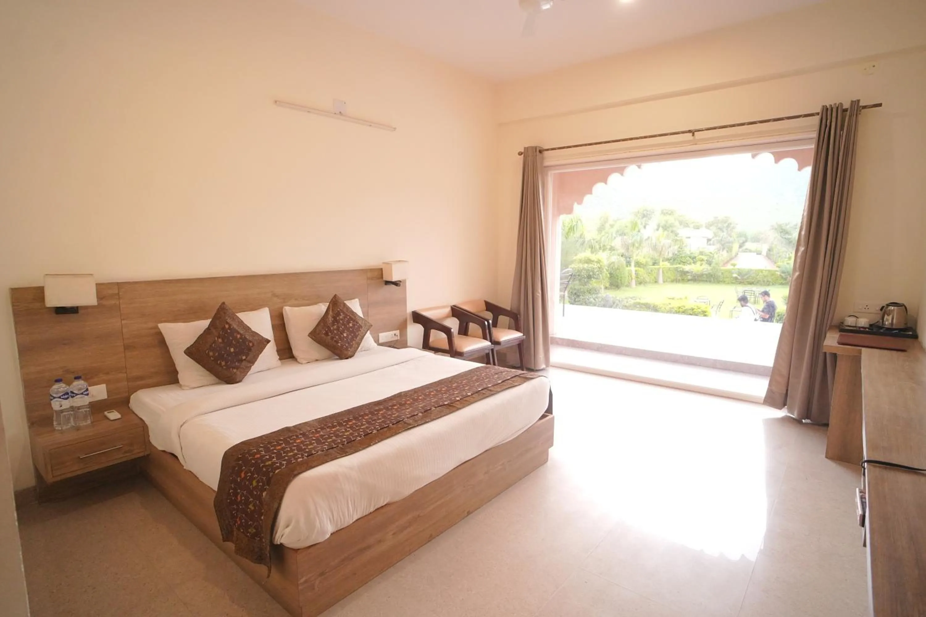 Bedroom, Bed in Dhawala Resort By Aamod