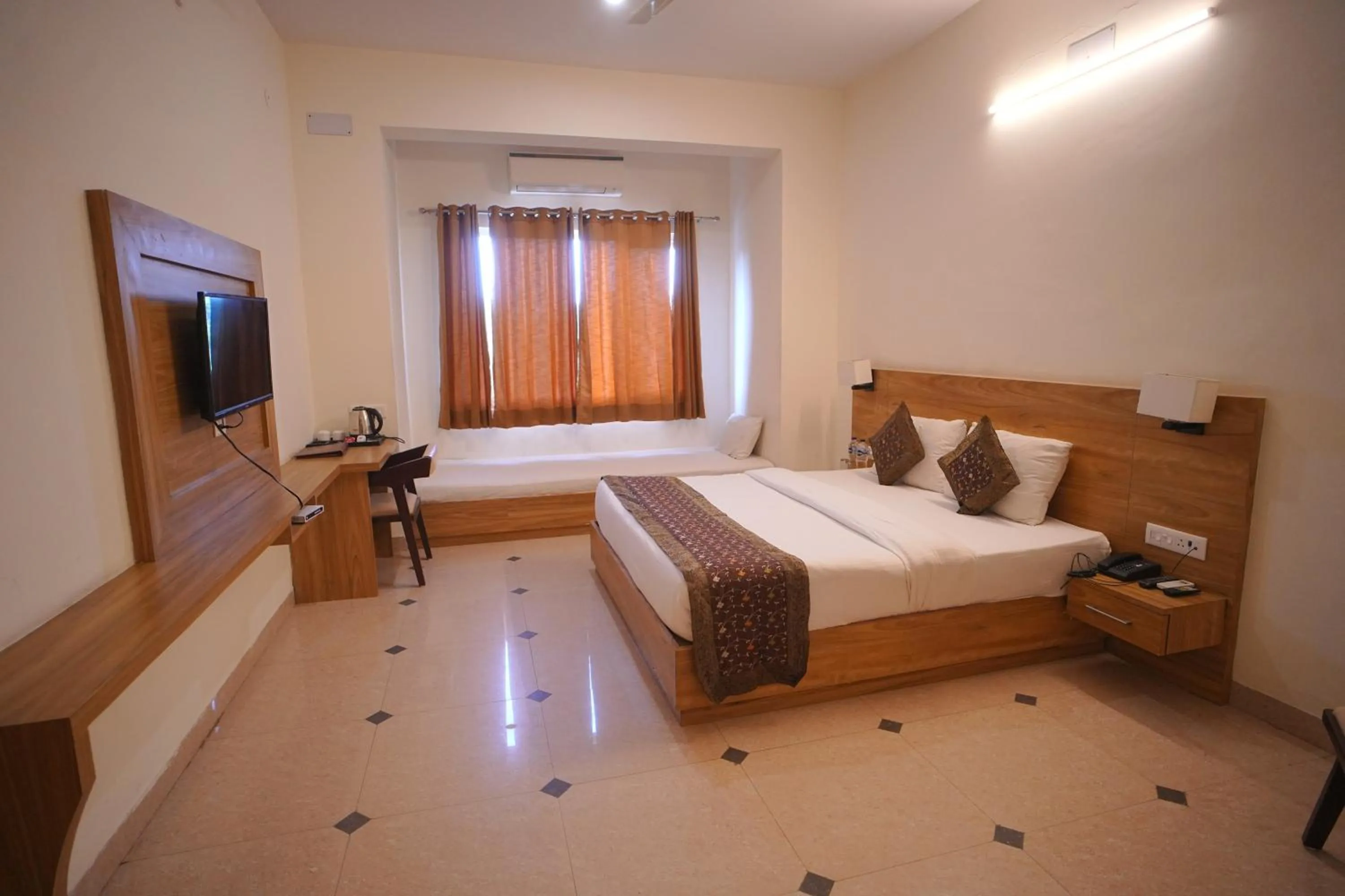 Bedroom, Bed in Dhawala Resort By Aamod