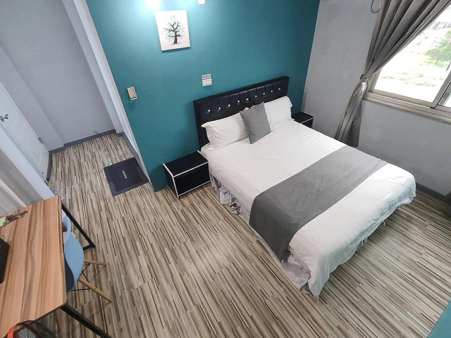 Photo of the whole room, Bed in Light Shadow