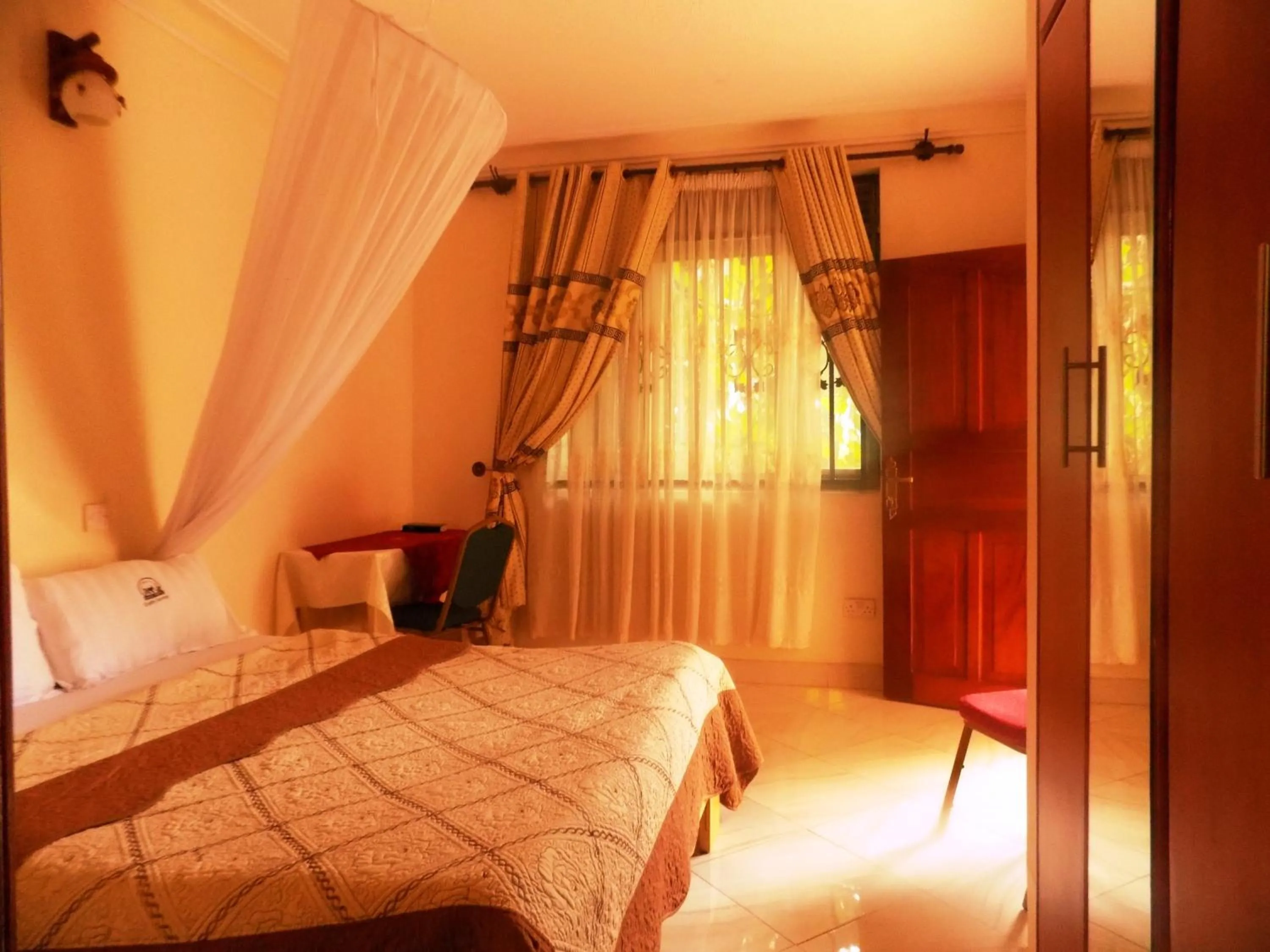 Bed in Rhino Motel Mbarara