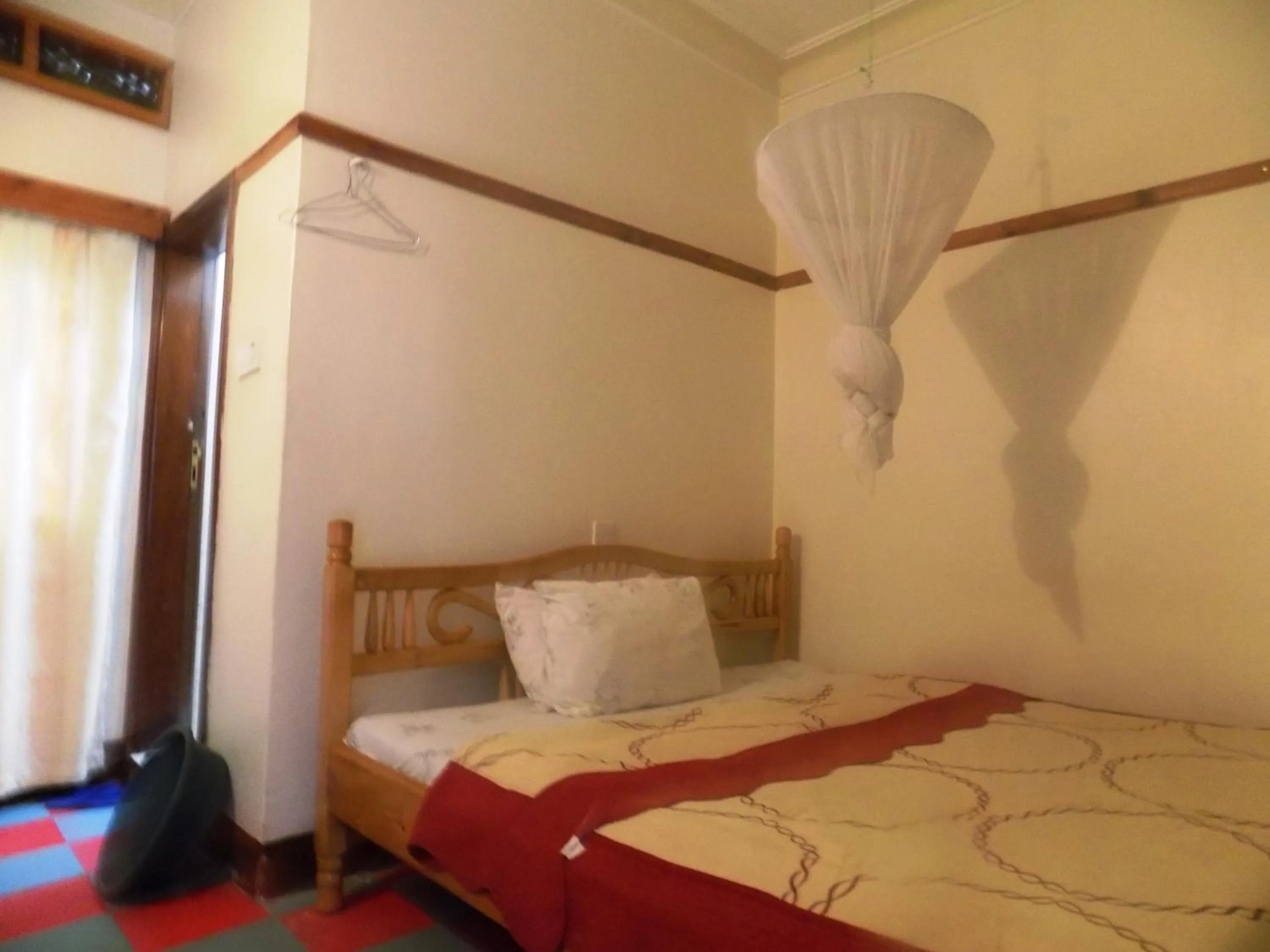 Bed in Rhino Motel Mbarara