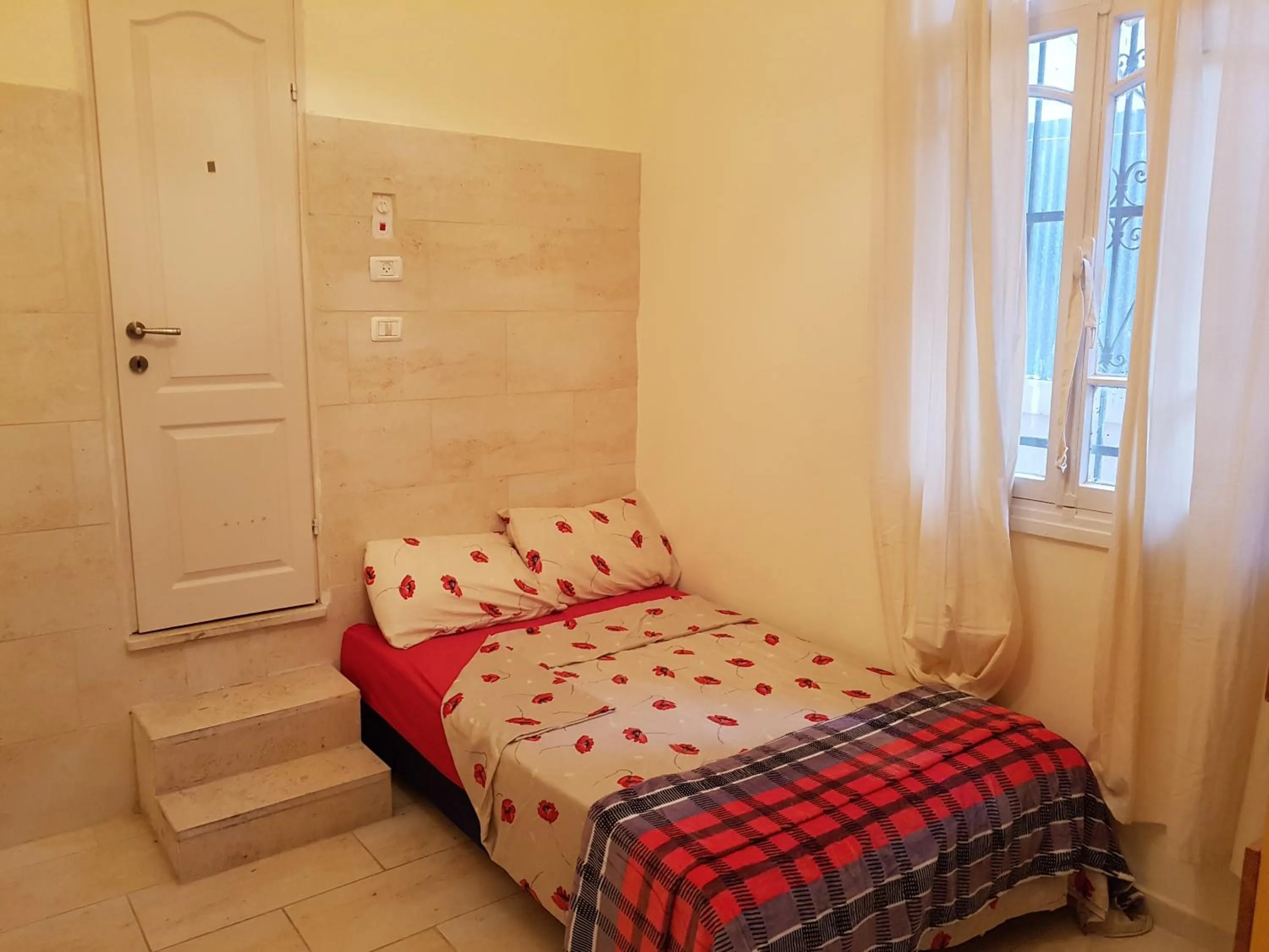 Bed in Tannous Aparthotel