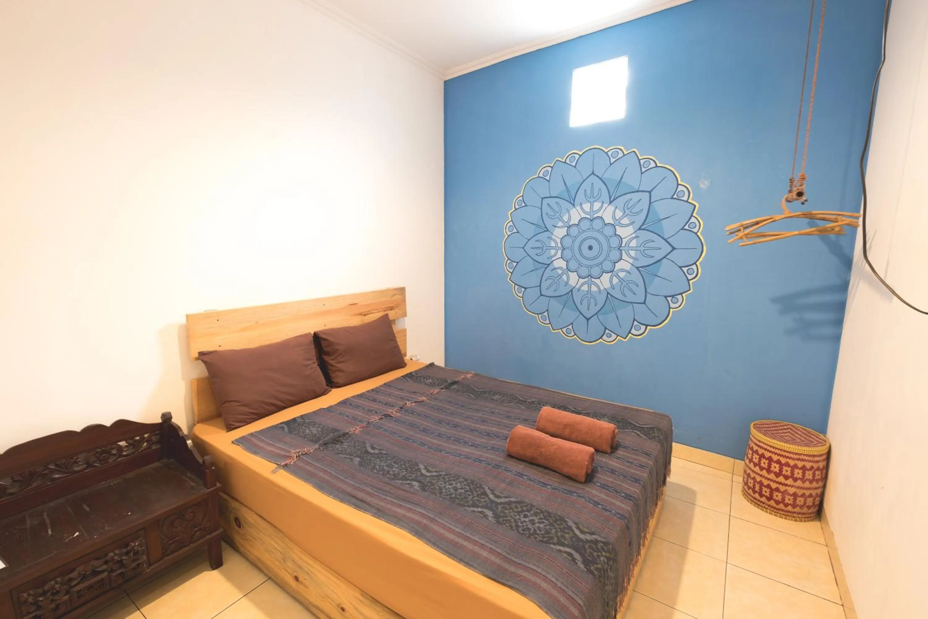 Bed in Happy Buddha Yogyakarta