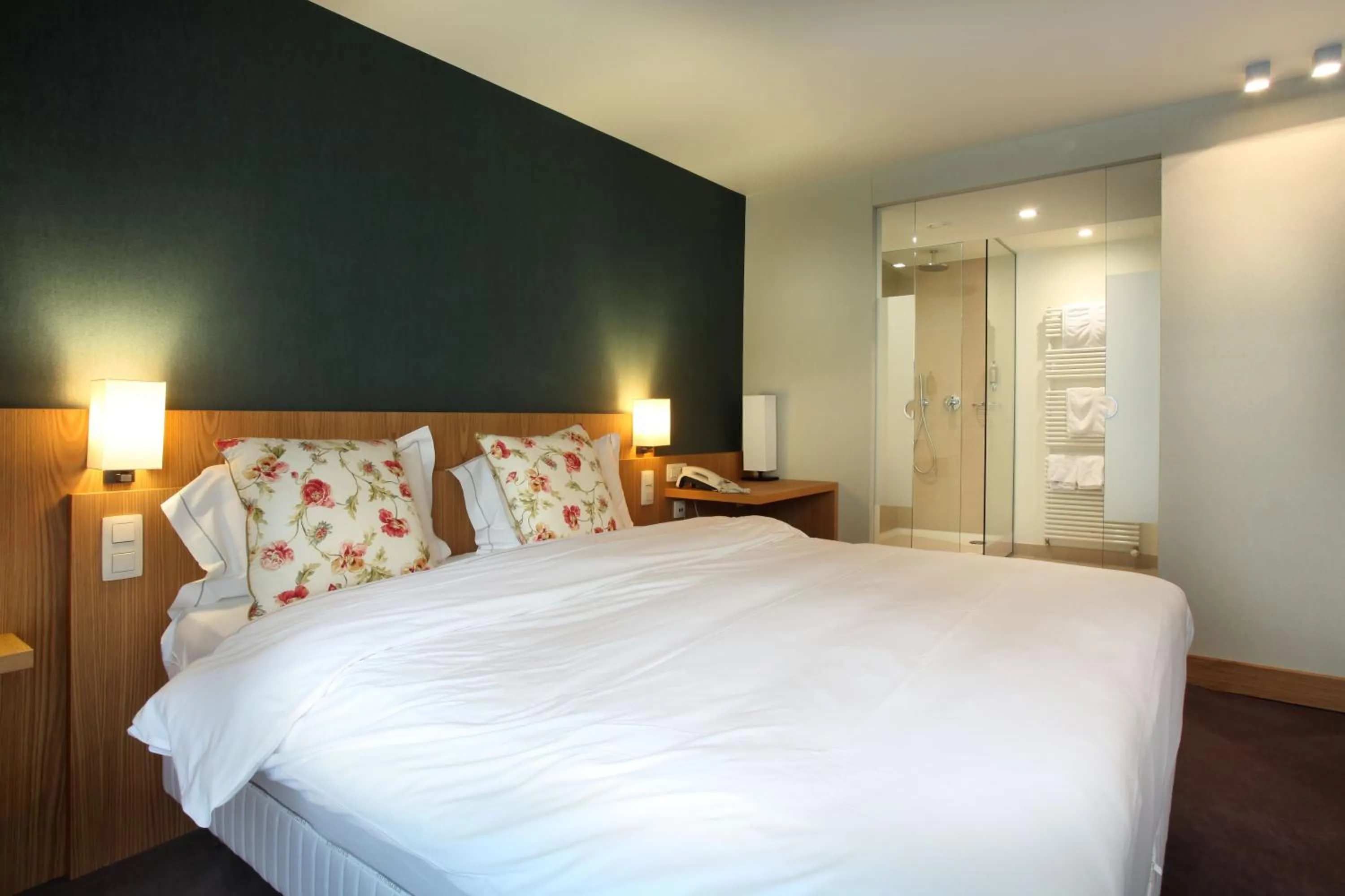 Bed in Hotel des Bains & Wellness