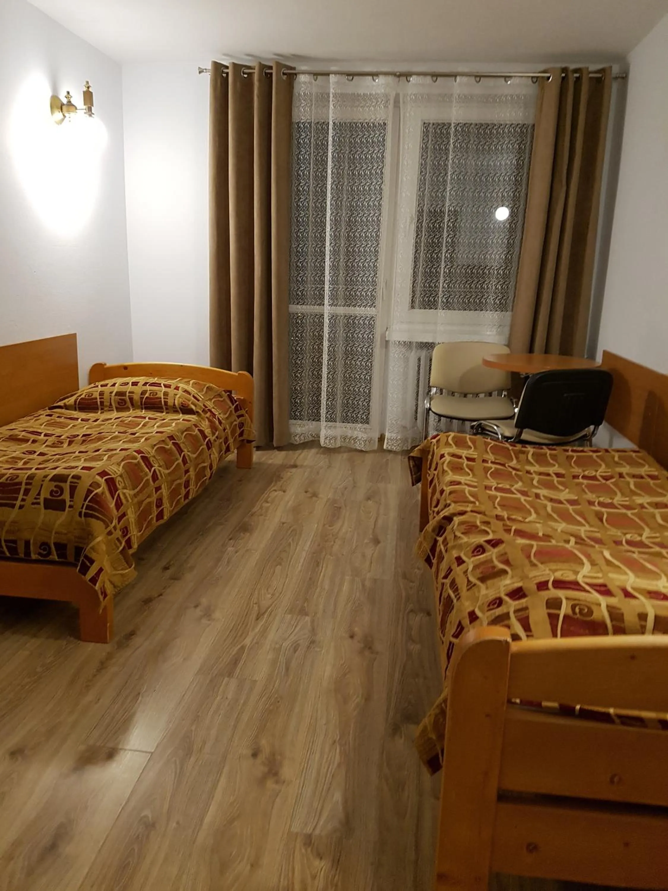 Bed in KORONA Sanatorium Uzdrowiskowe