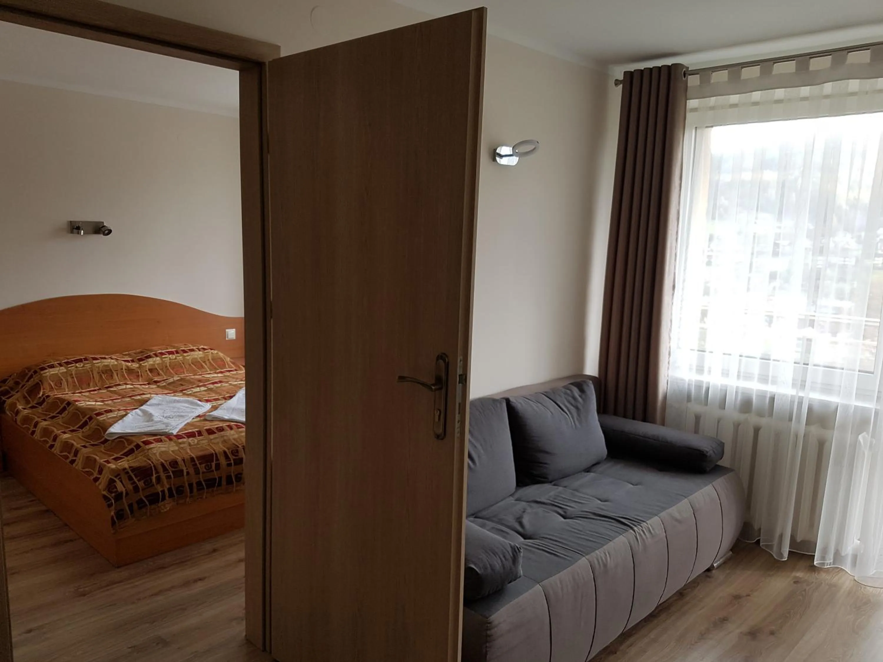 Bed in KORONA Sanatorium Uzdrowiskowe