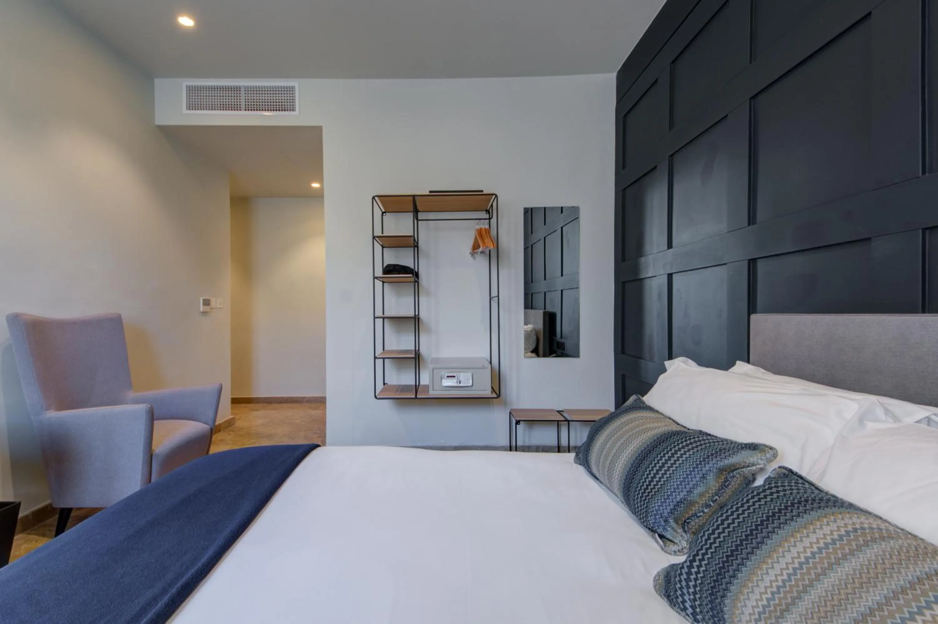 Bed in The Manoel Boutique Hotel