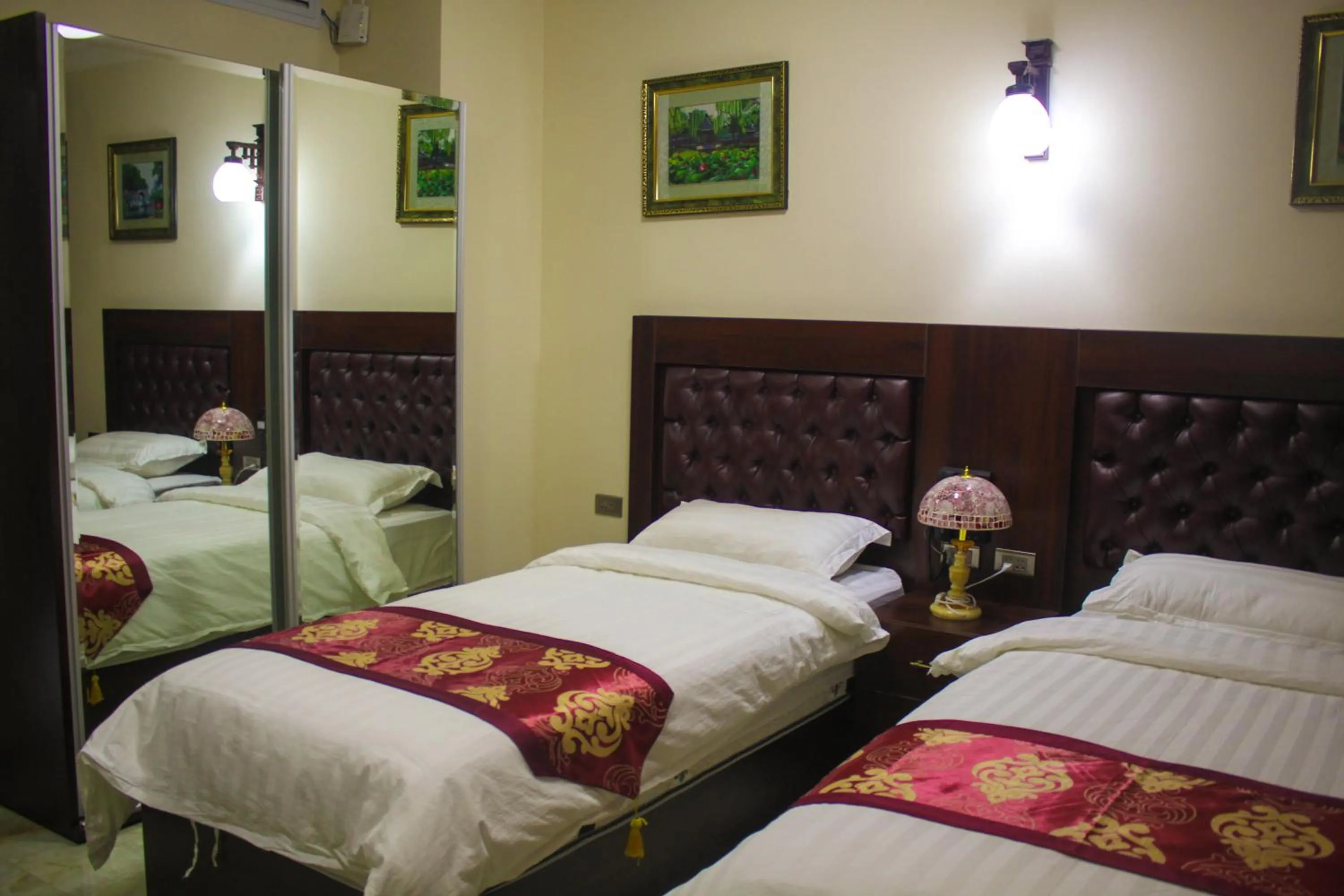 Bed in Qaser Al-Sultan Hotel Suites