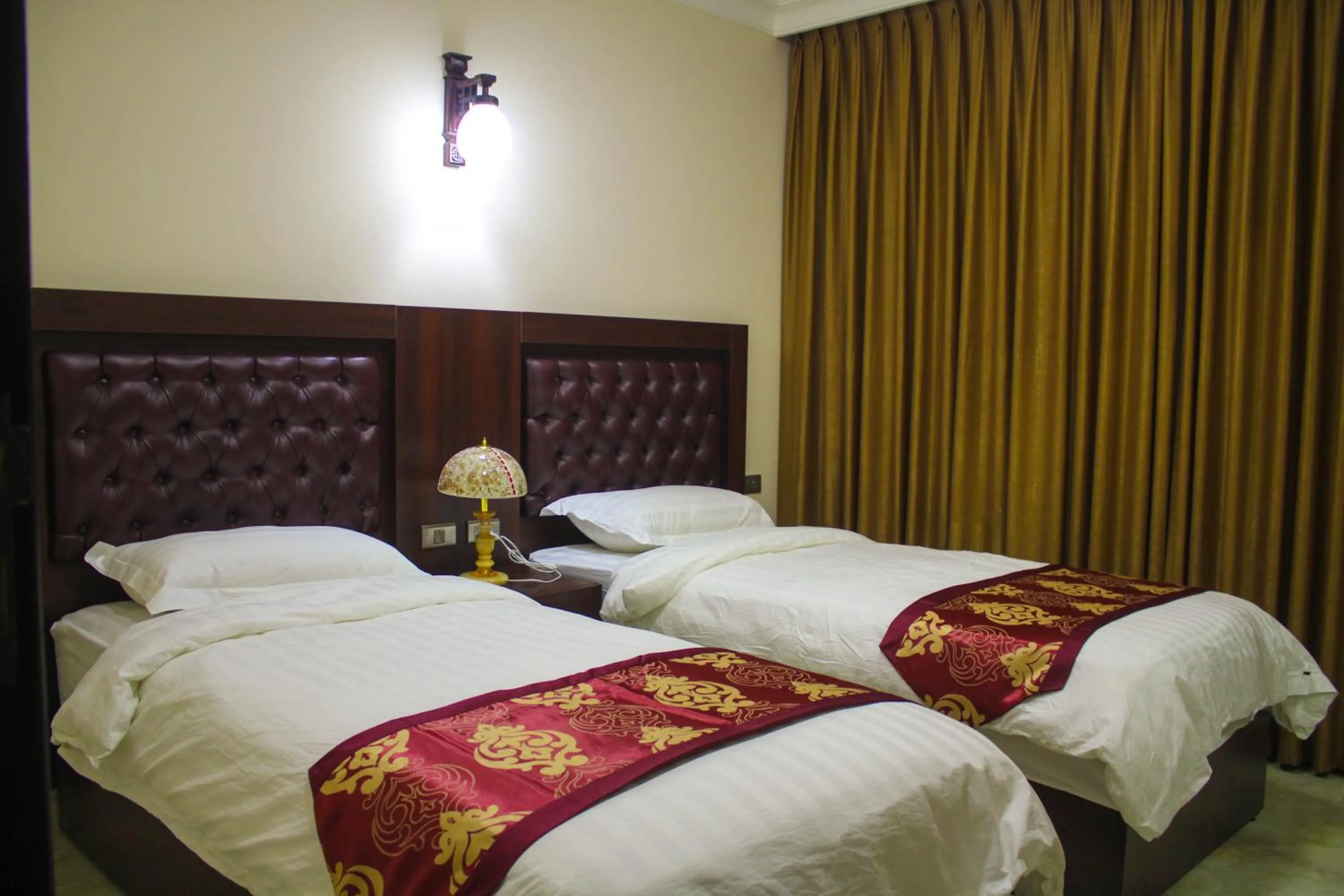 Photo of the whole room, Bed in Qaser Al-Sultan Hotel Suites