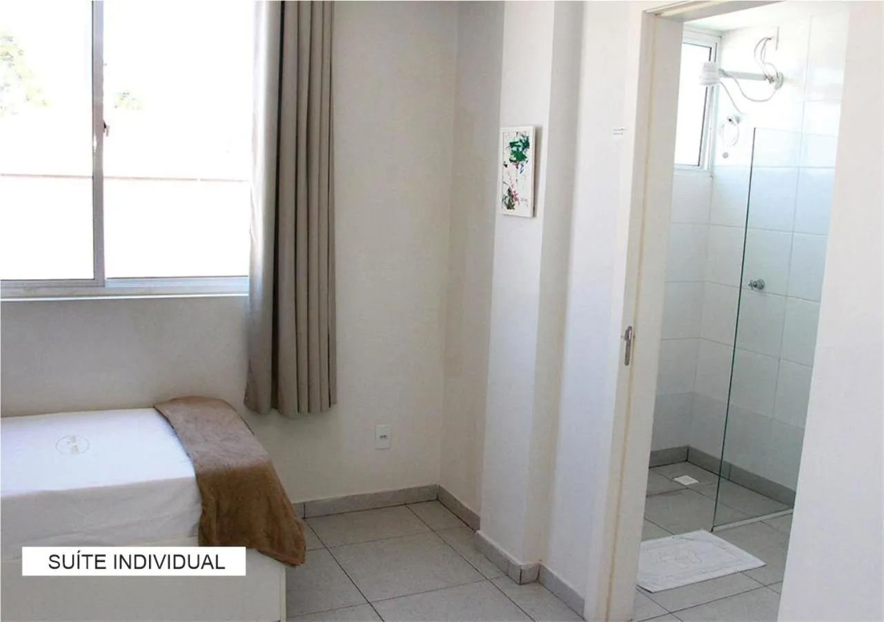 Single Room with Bathroom - single occupancy in Villa Tata Suítes Ltda