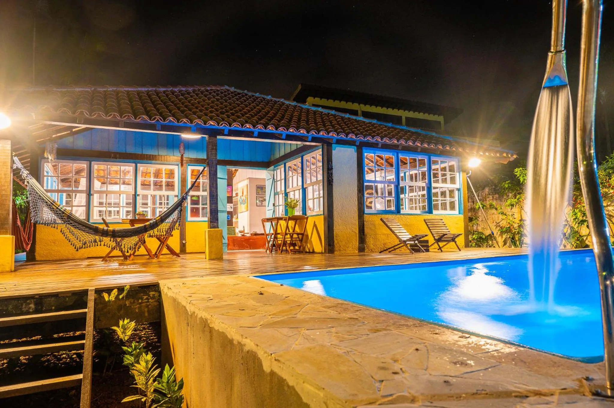 Swimming pool in Casa do Pescador Camburi