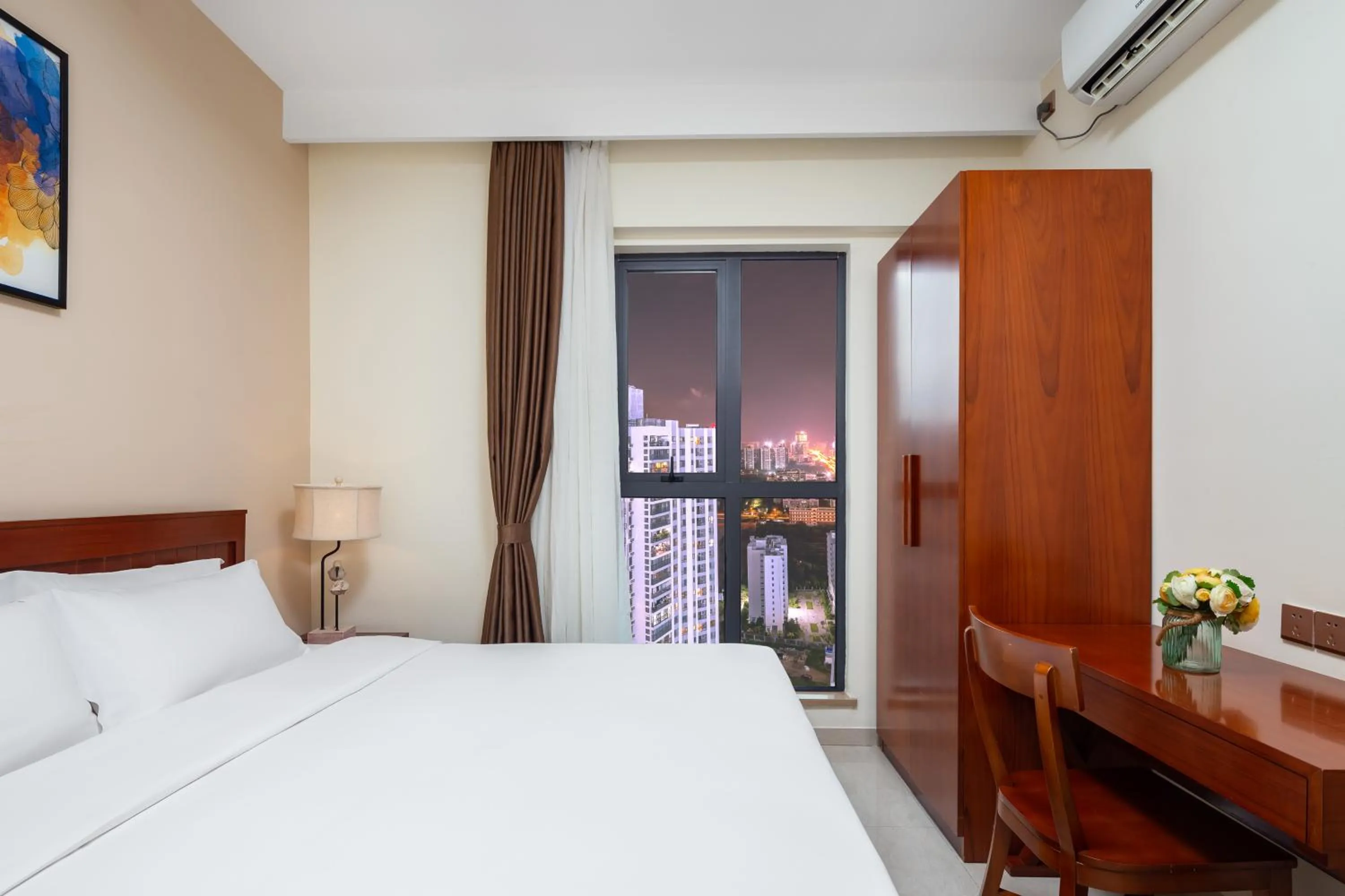 Bedroom in Paxton Vacances Hotel & Suite Sanya