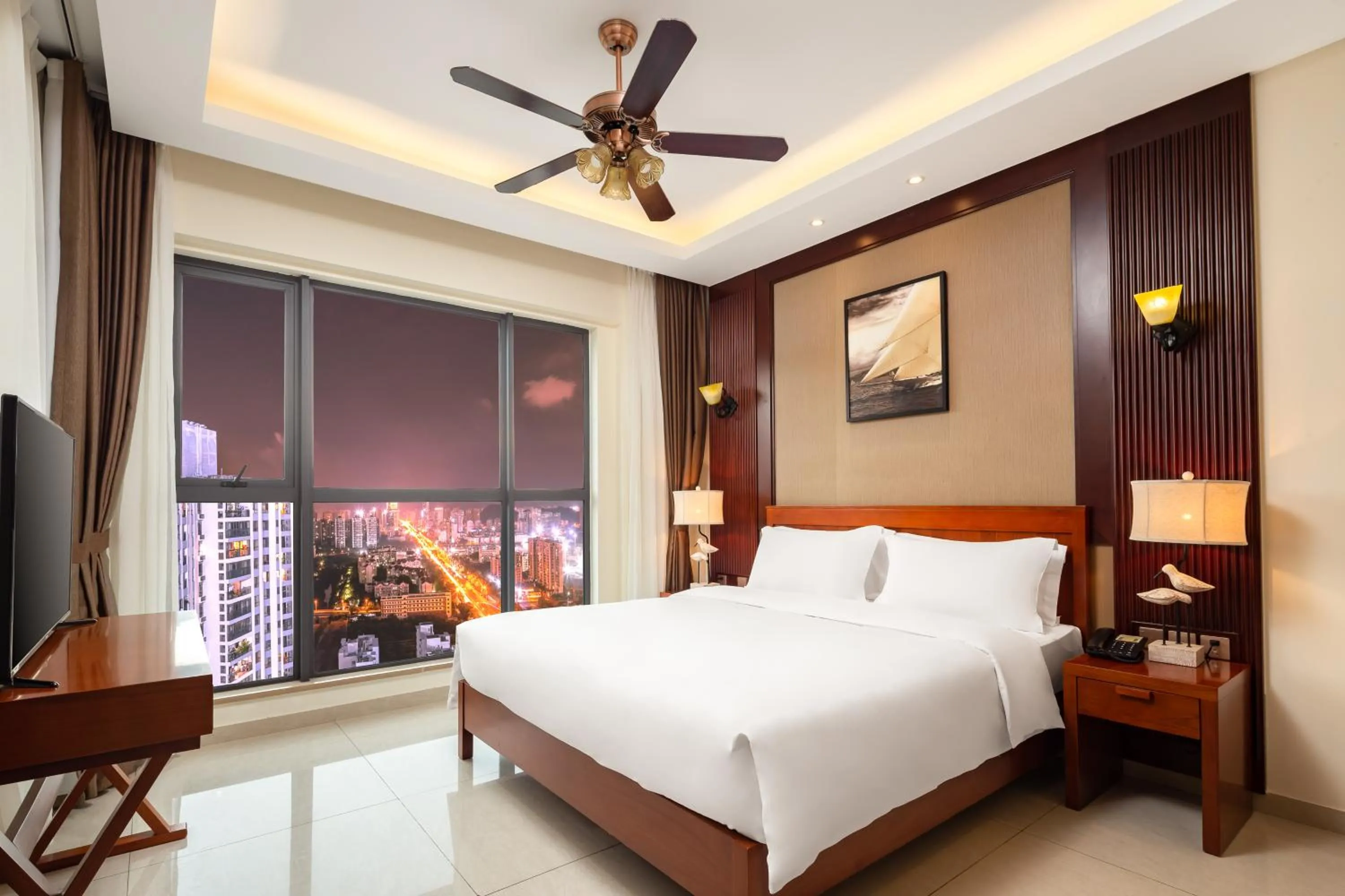 Bedroom in Paxton Vacances Hotel & Suite Sanya