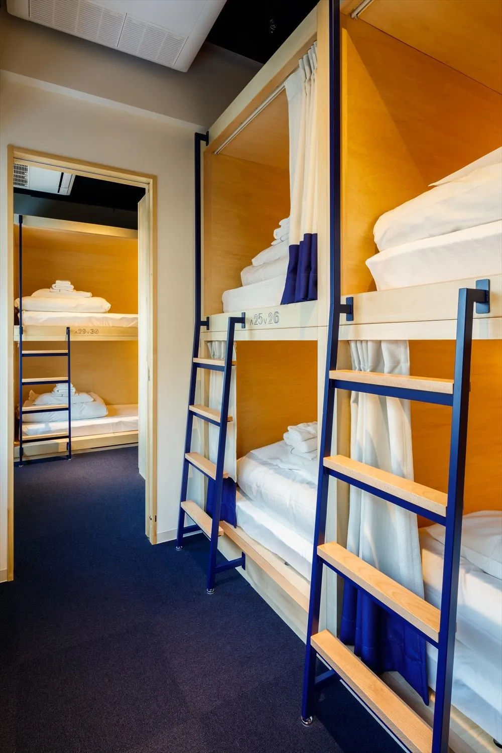 Bed in LYURO Tokyo Kiyosumi by THE SHARE HOTELS