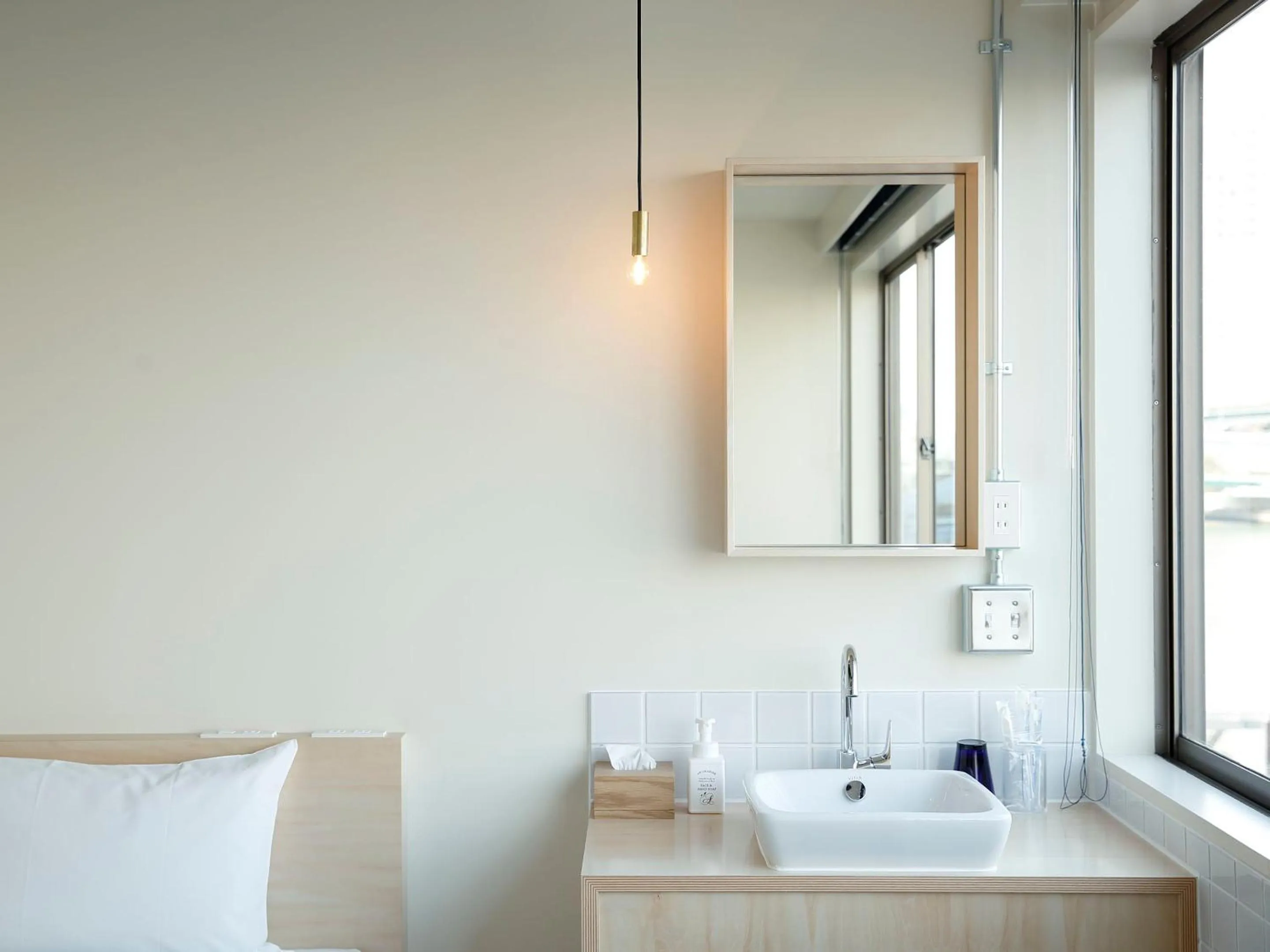 Bed in LYURO Tokyo Kiyosumi by THE SHARE HOTELS