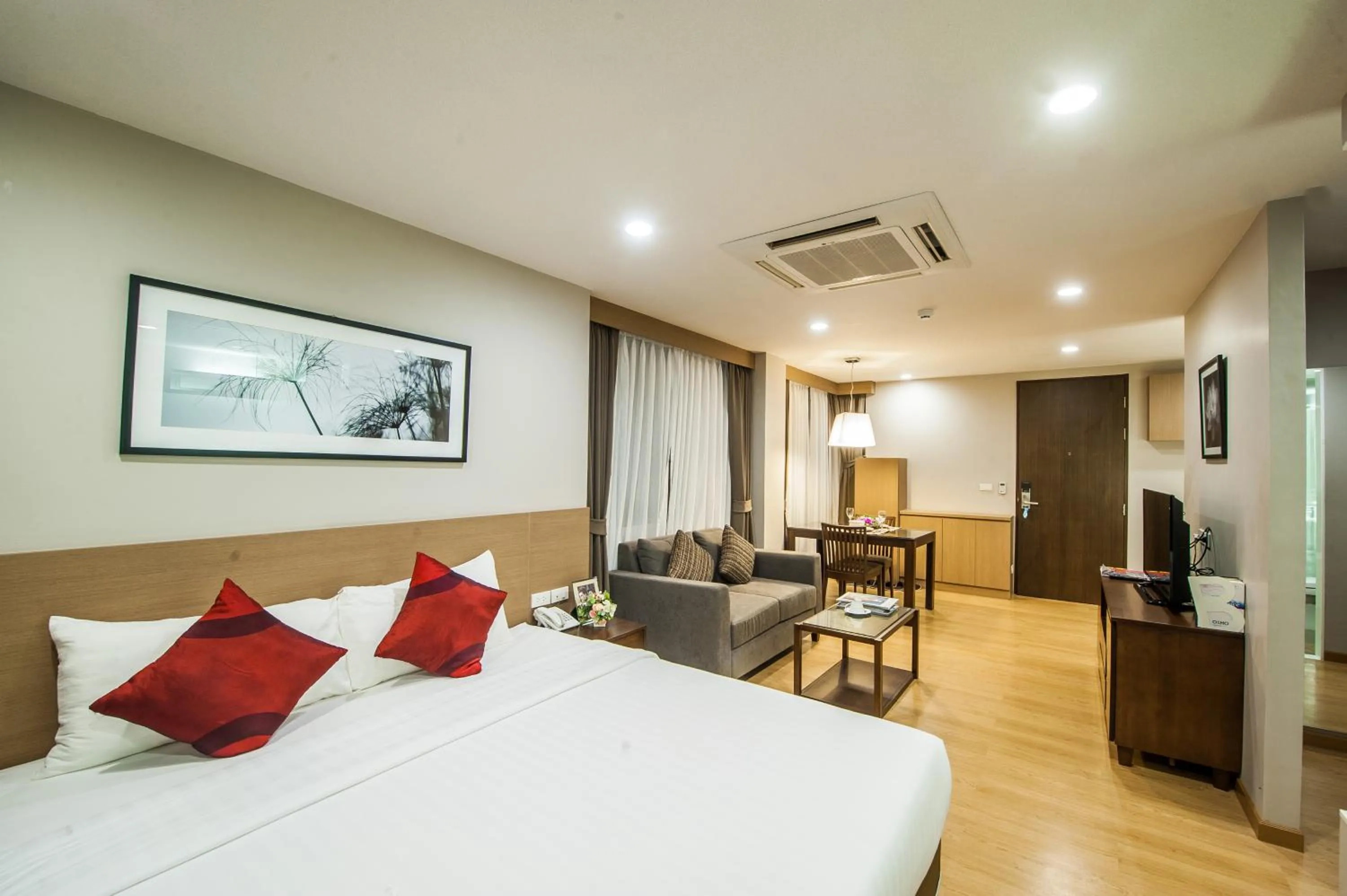 Bed in Burgundy Residence 304