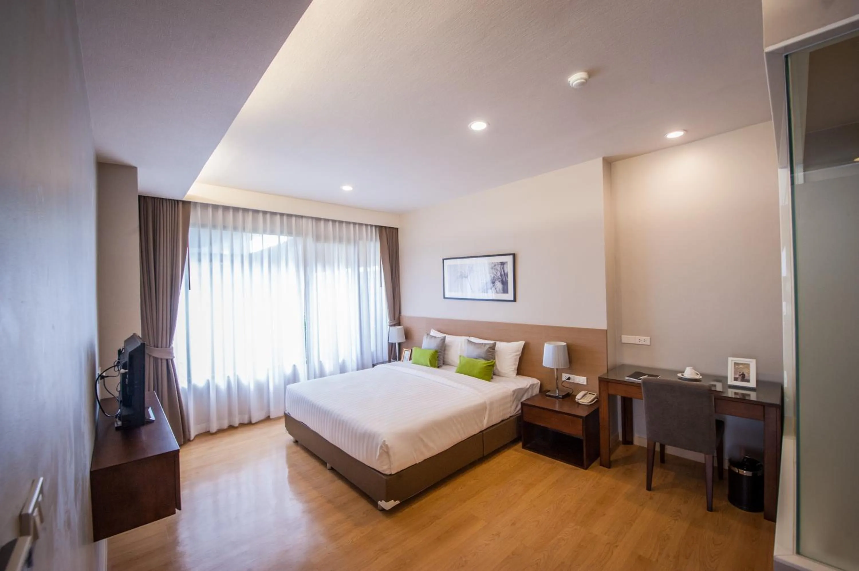 Bed in Burgundy Residence 304