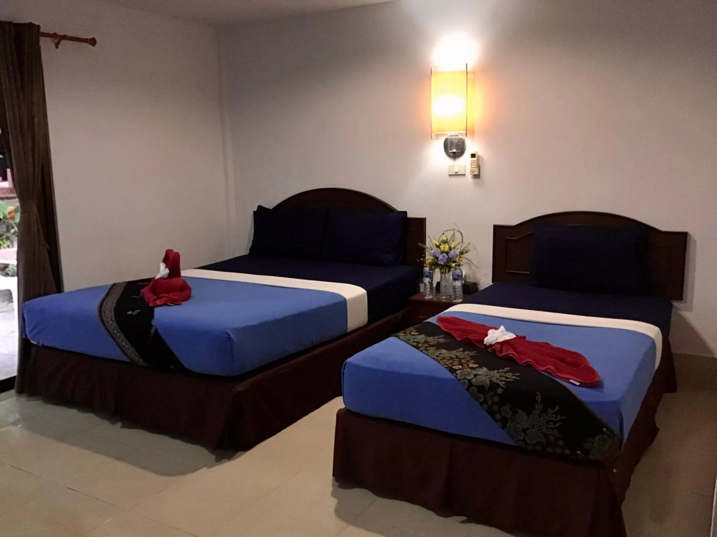 Bed in Andaman Beach Resort Koh Jum
