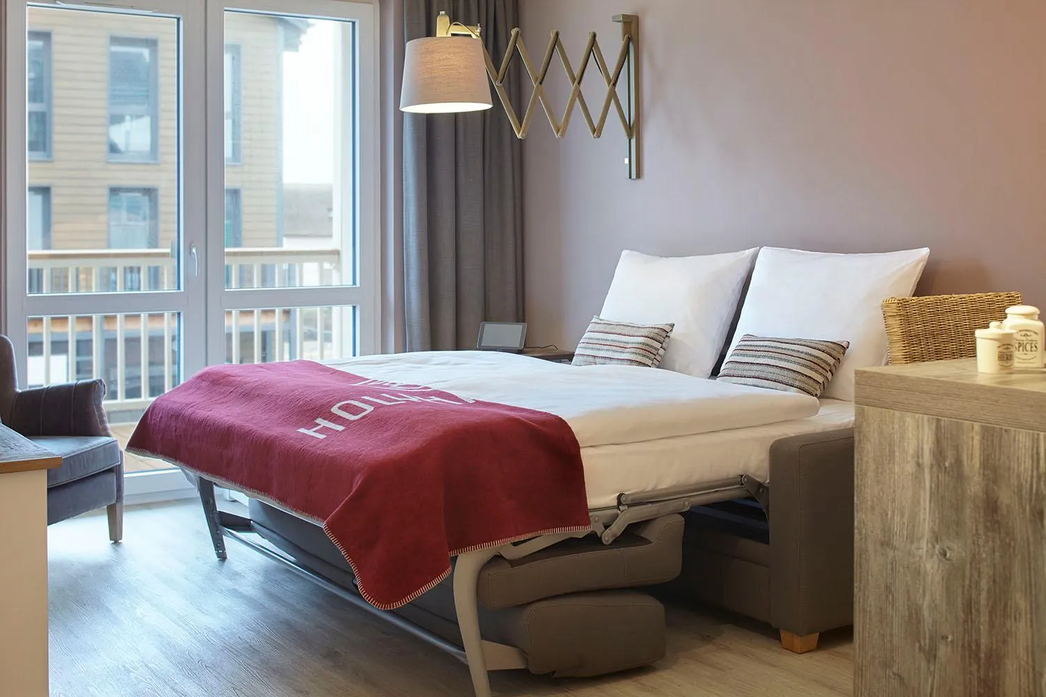 Living room, Bed in Beach Apartments Heiligenhafen