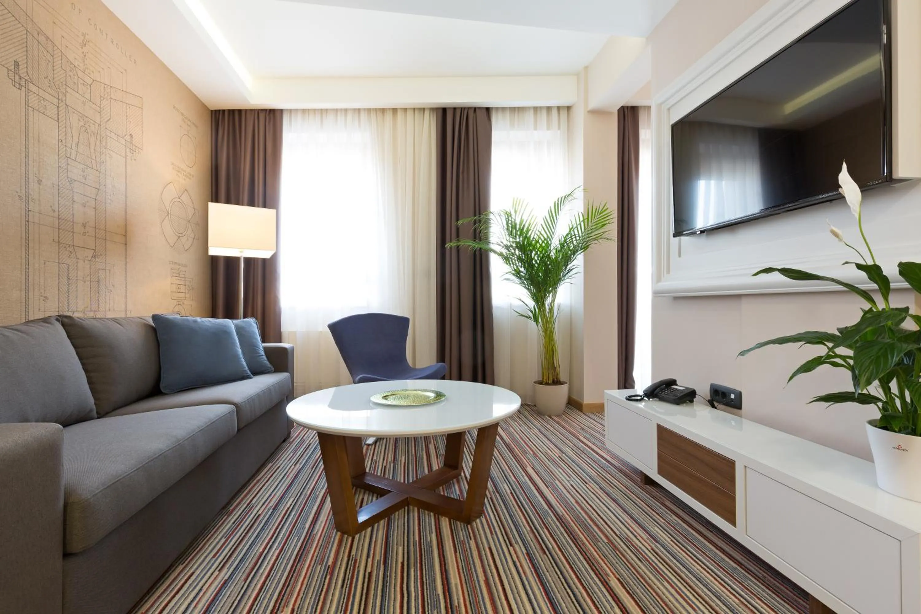 Living room in Hotel TESLA - Smart Stay Garni