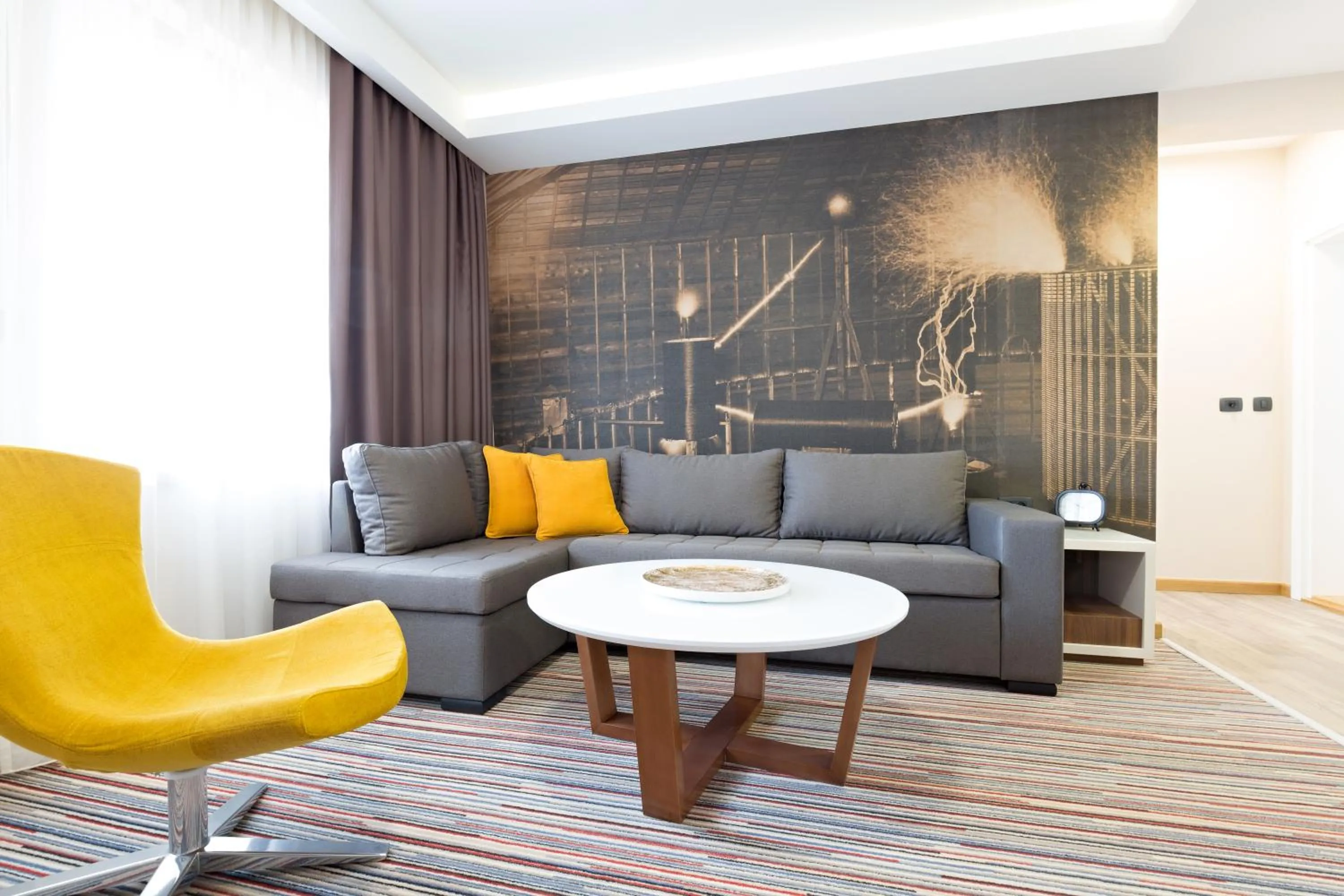 Seating area in Hotel TESLA - Smart Stay Garni