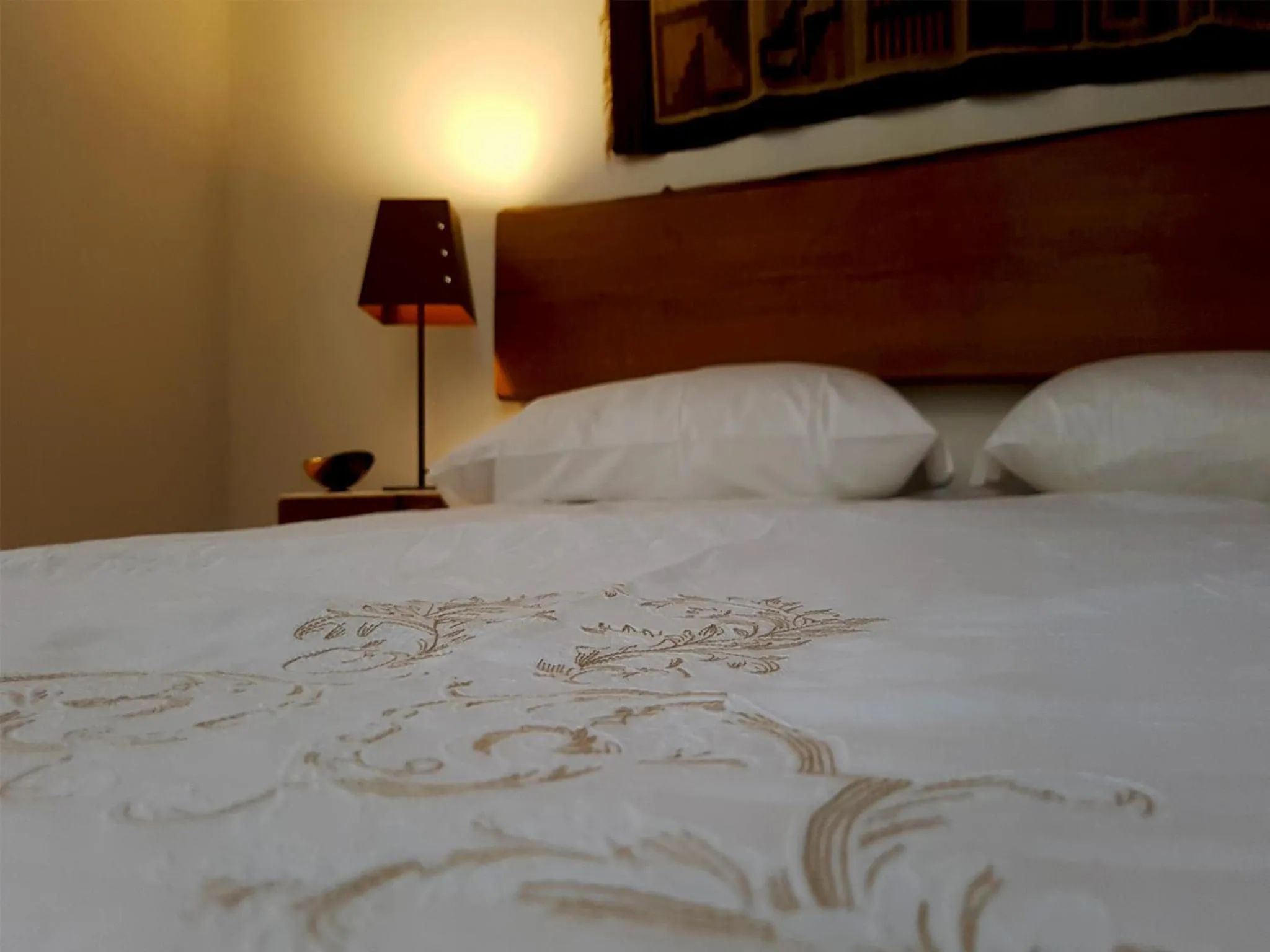 Decorative detail, Bed in B&B re apartments Palazzo Muscati