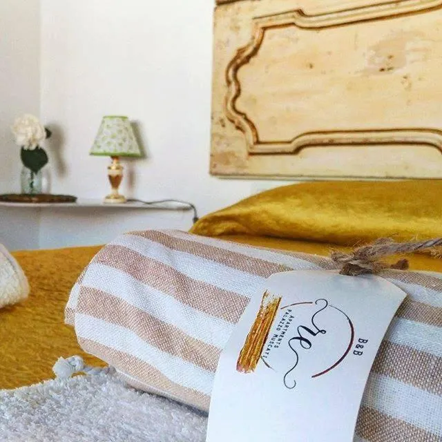 Decorative detail, Bed in B&B re apartments Palazzo Muscati