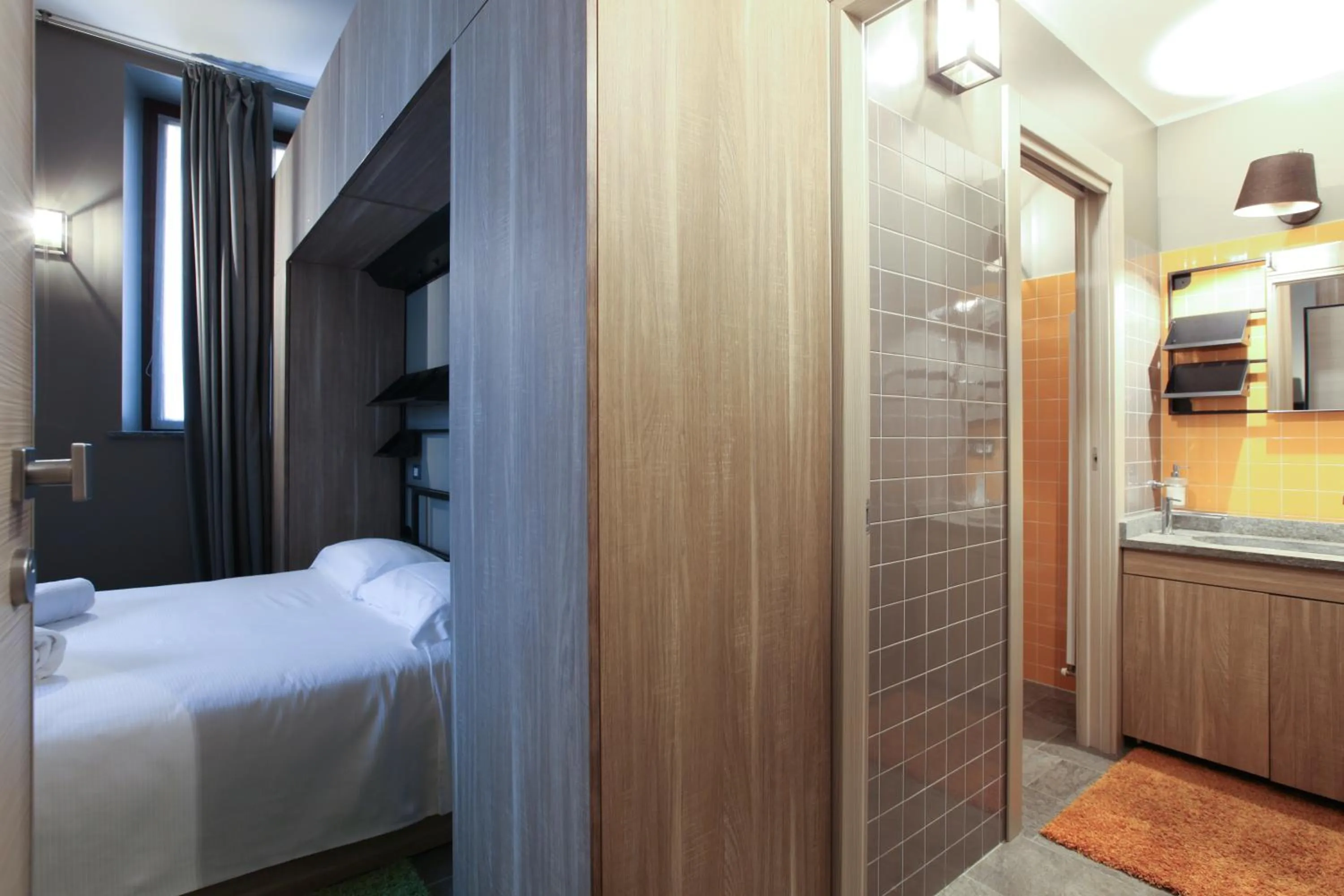 Photo of the whole room, Bed in VERSOVERDE HOTEL Alzaia Naviglio Grande