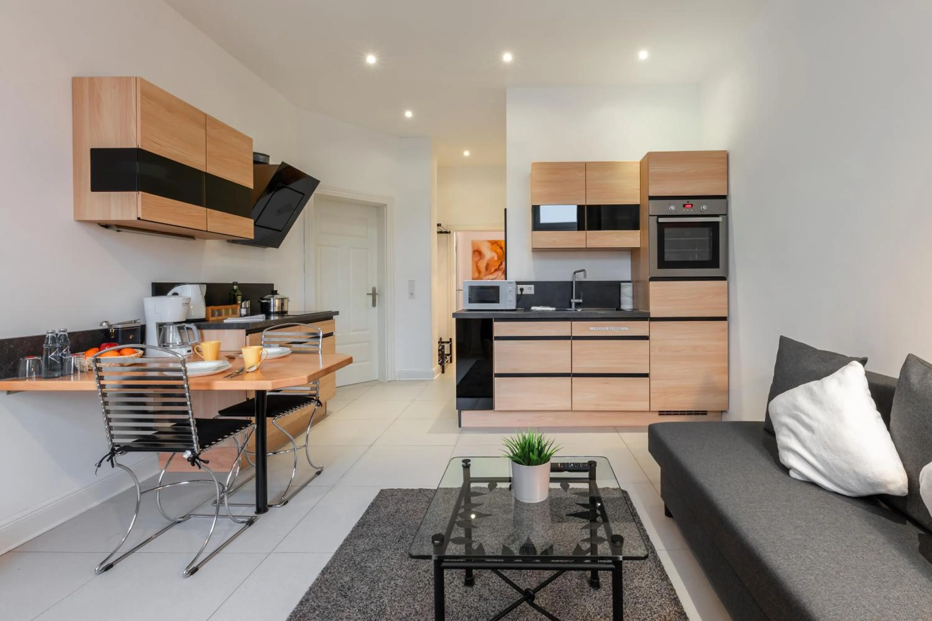 Kitchen or kitchenette in Appartements an der Therme