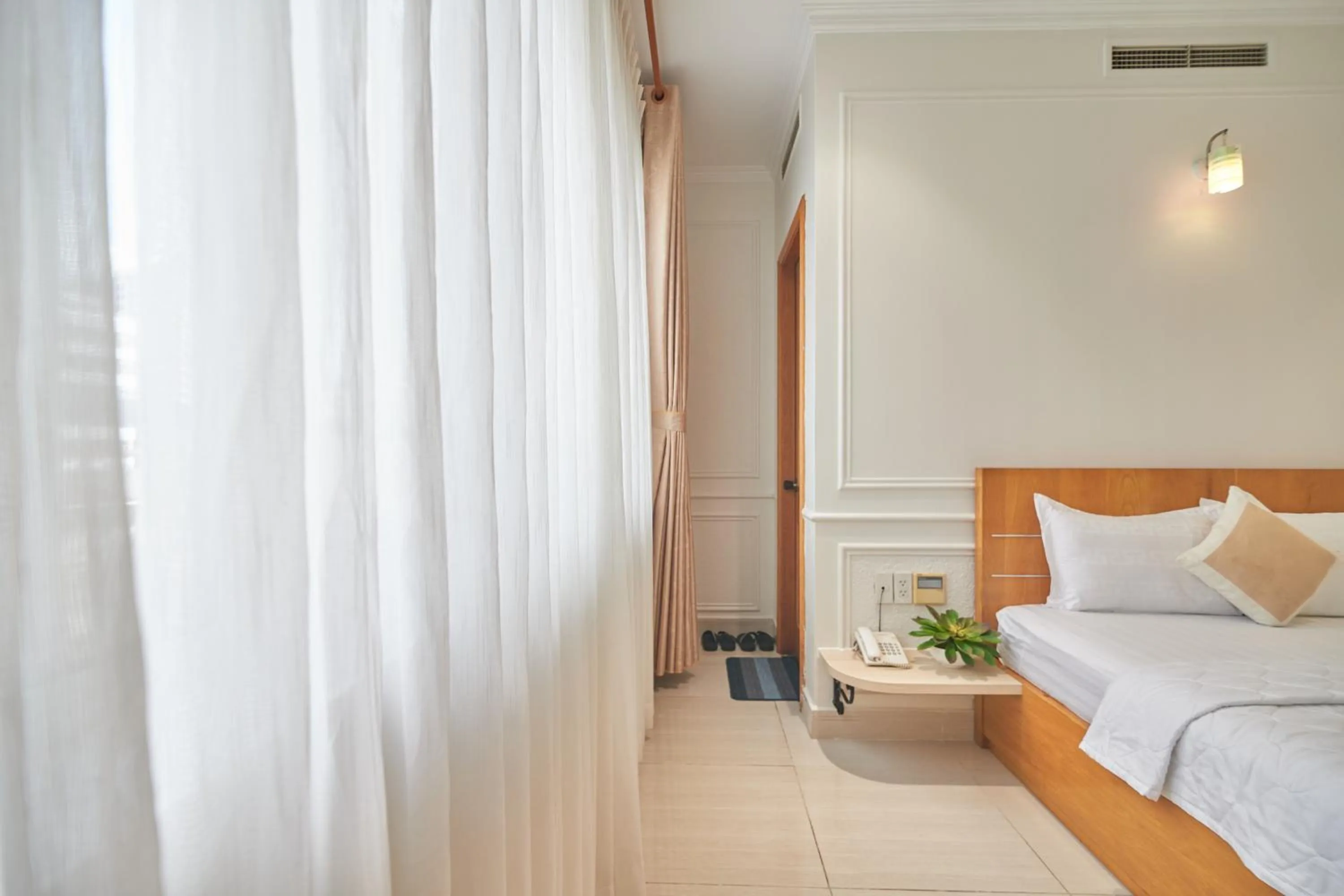 Photo of the whole room, Bed in Bin Bin 10 - Mimosa Hotel Near Tan Son Nhat Airport