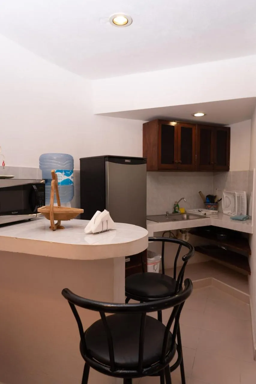 Kitchen or kitchenette in Casa Bonita and villas